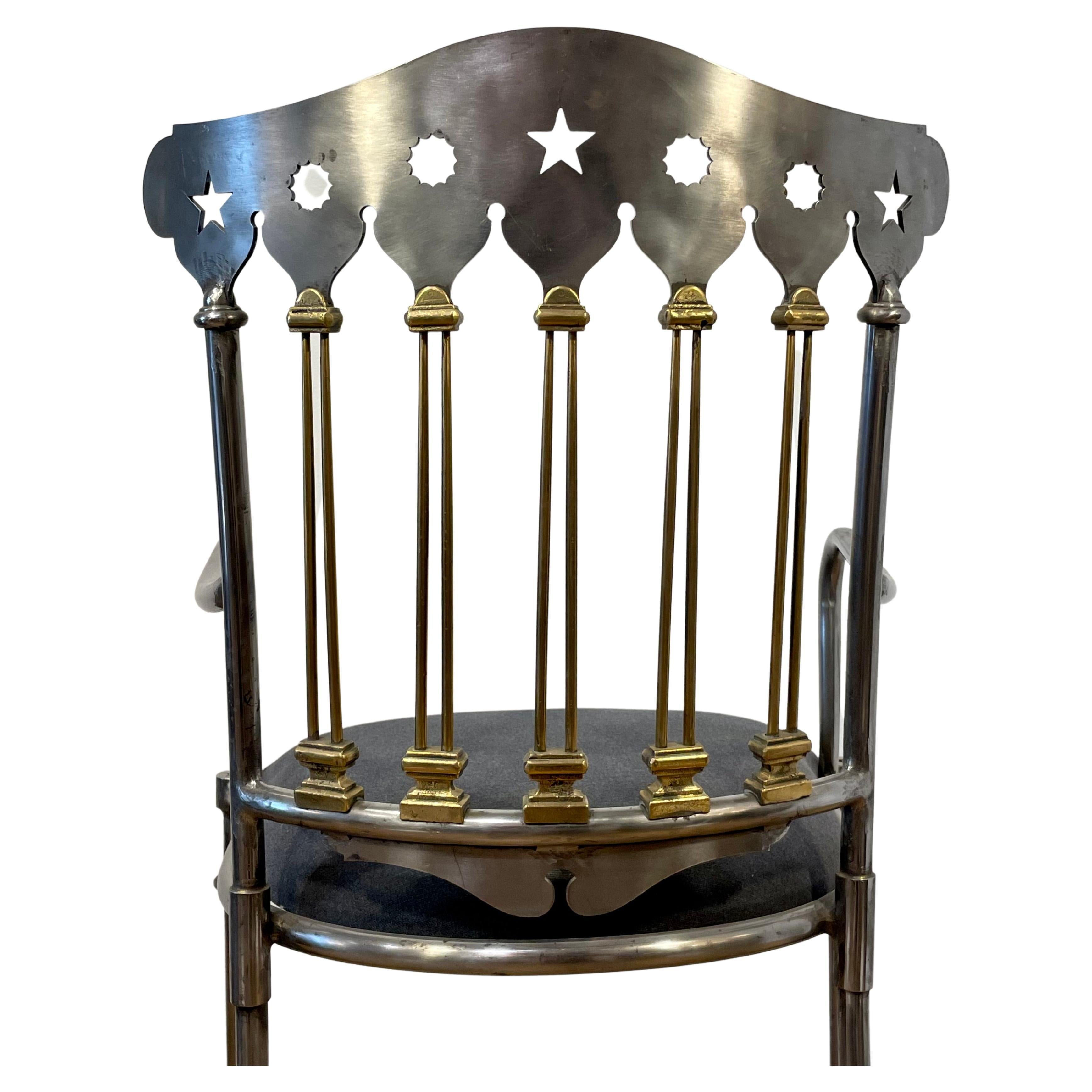 Hand-casted steel and brass dining chairs
Star motif seatback.


