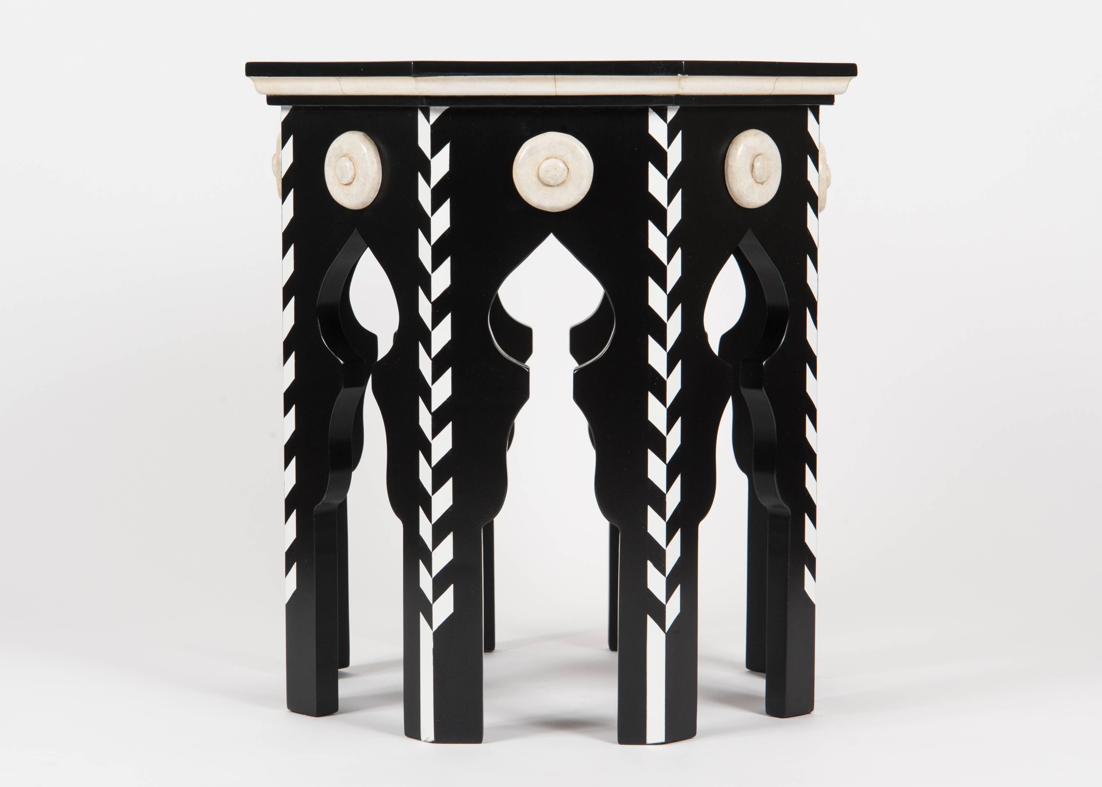 Martyn Lawrence Bullard's custom pasha side table in ebony finish and faux ivory details.
Priced on above finish, please ask for a quote for other finishes.