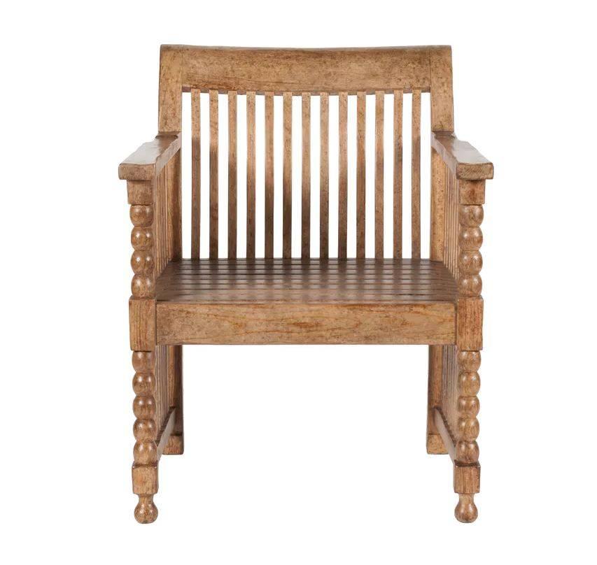 Martyn Lawrence Bullard's custom java chair.
Inspired by Dutch colonial furniture, these deep chairs are perfect both indoors and out. The slat design brings light to the overall feel whilst the 