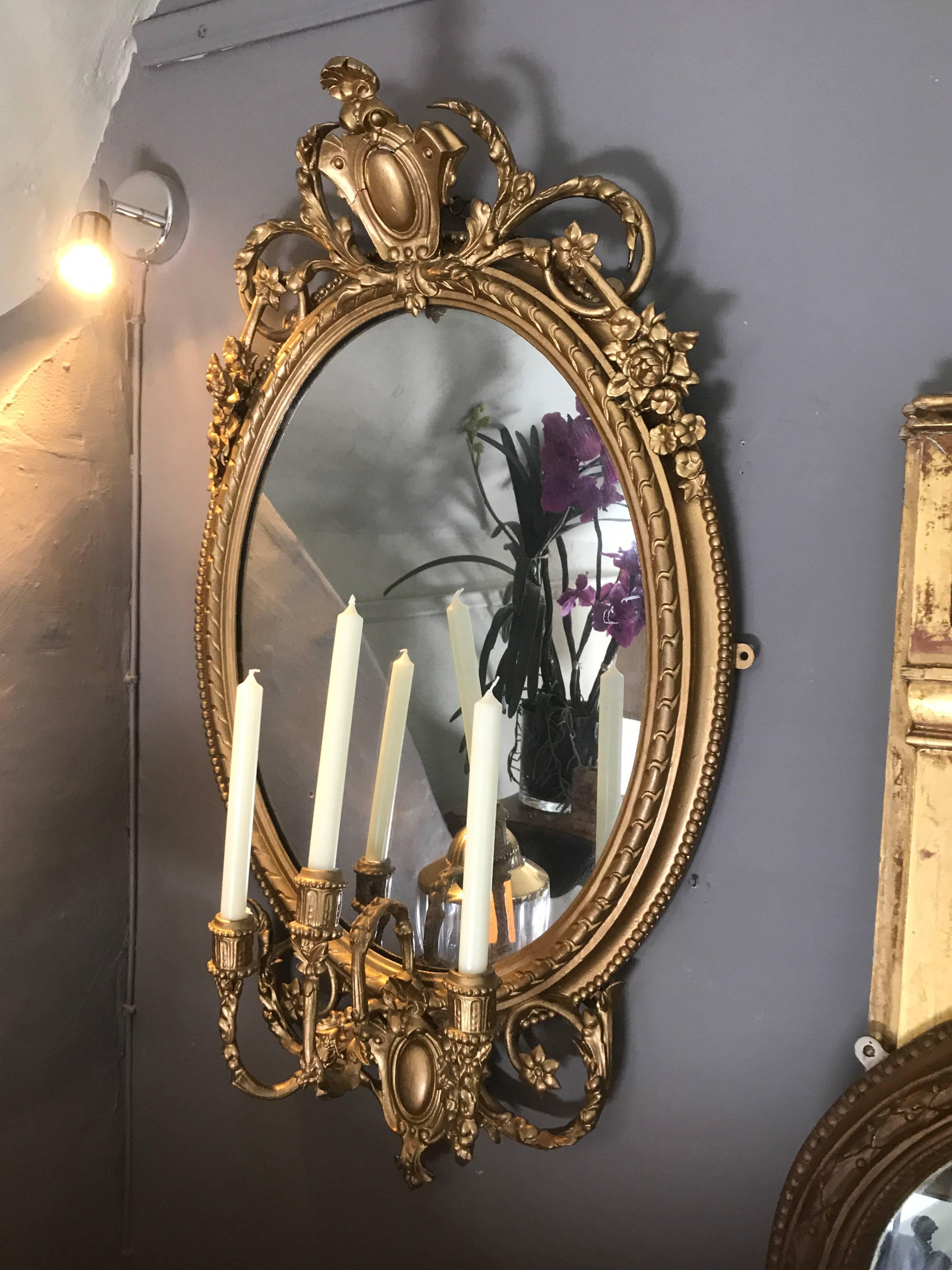 A 19th century girondelle mirror with original mercury plate.
