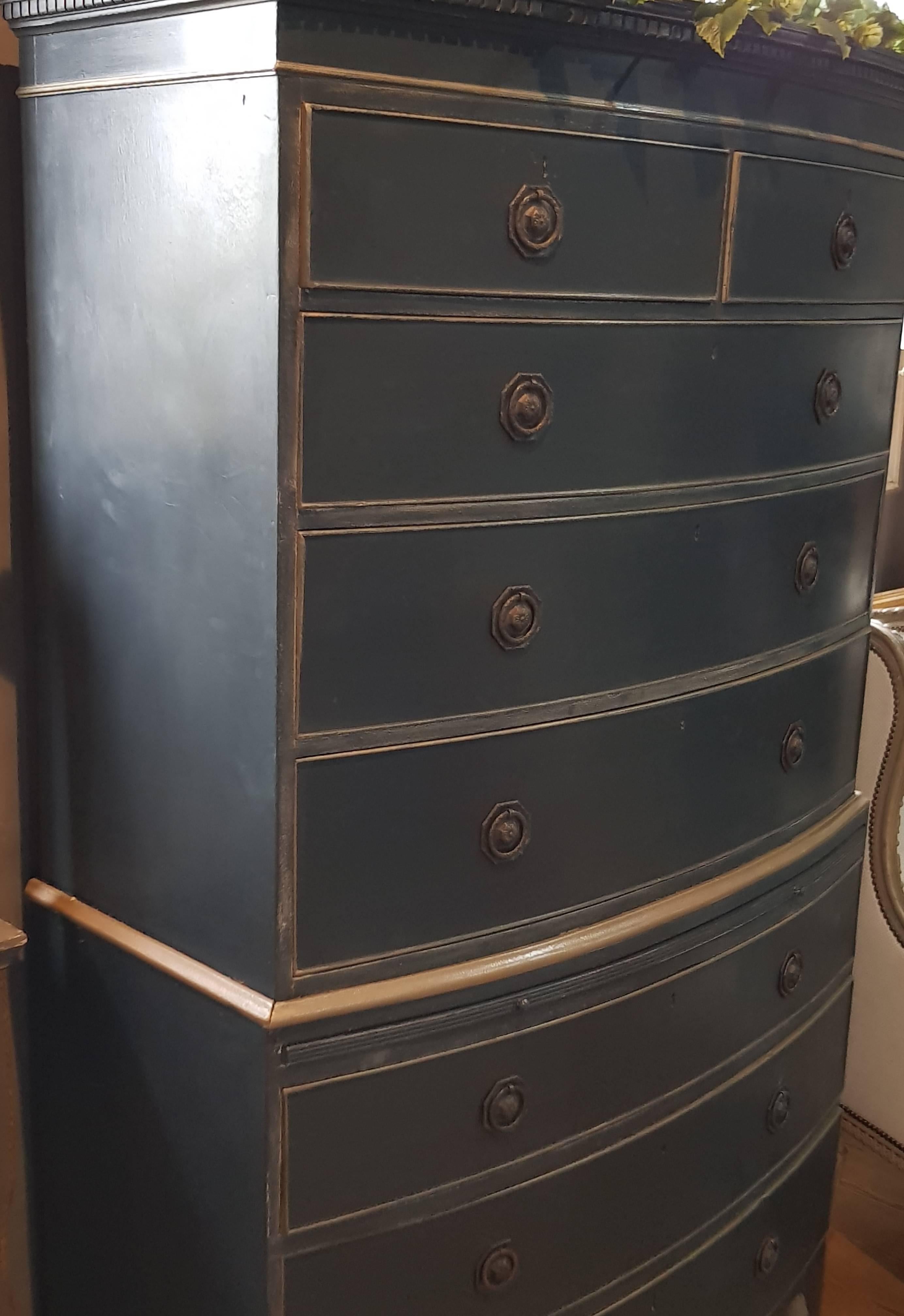 A Georgian painted and distressed bow fronted chest on chest.