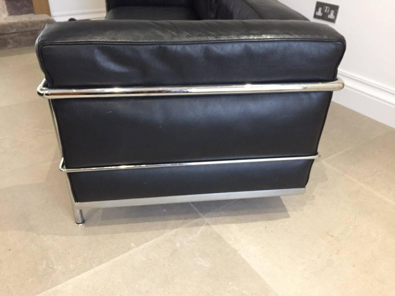 Iconic rare designer original Cassina LC3 Le Corbusier vintage leather sofa 
Two-seat black leather
to purchase today would cost £7500
in very good condition generally
few aged related minor marks
well looked after.

 