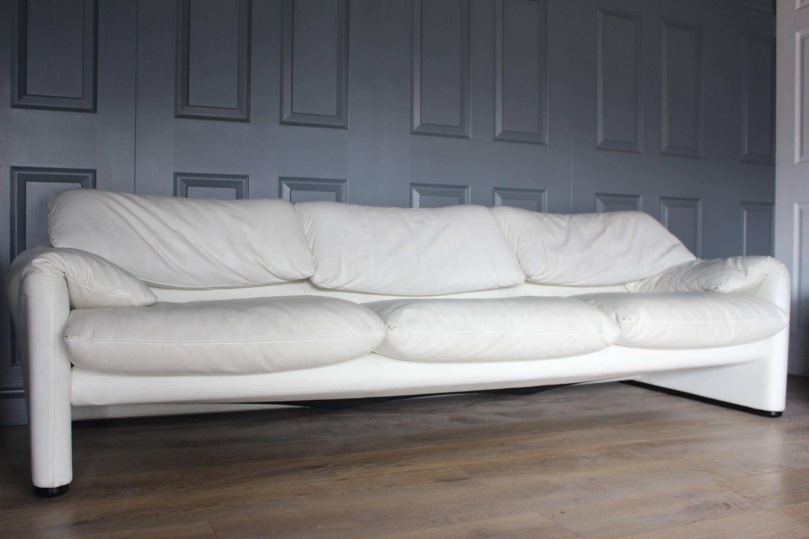 Designer Cassina Maralunga by Vico Magistretti white leather three-seat sofa 
RRP £9072 
great quality piece of furniture from well-known designer 
very good clean condition
well cared for
head mechanism works fine
iconic design

The