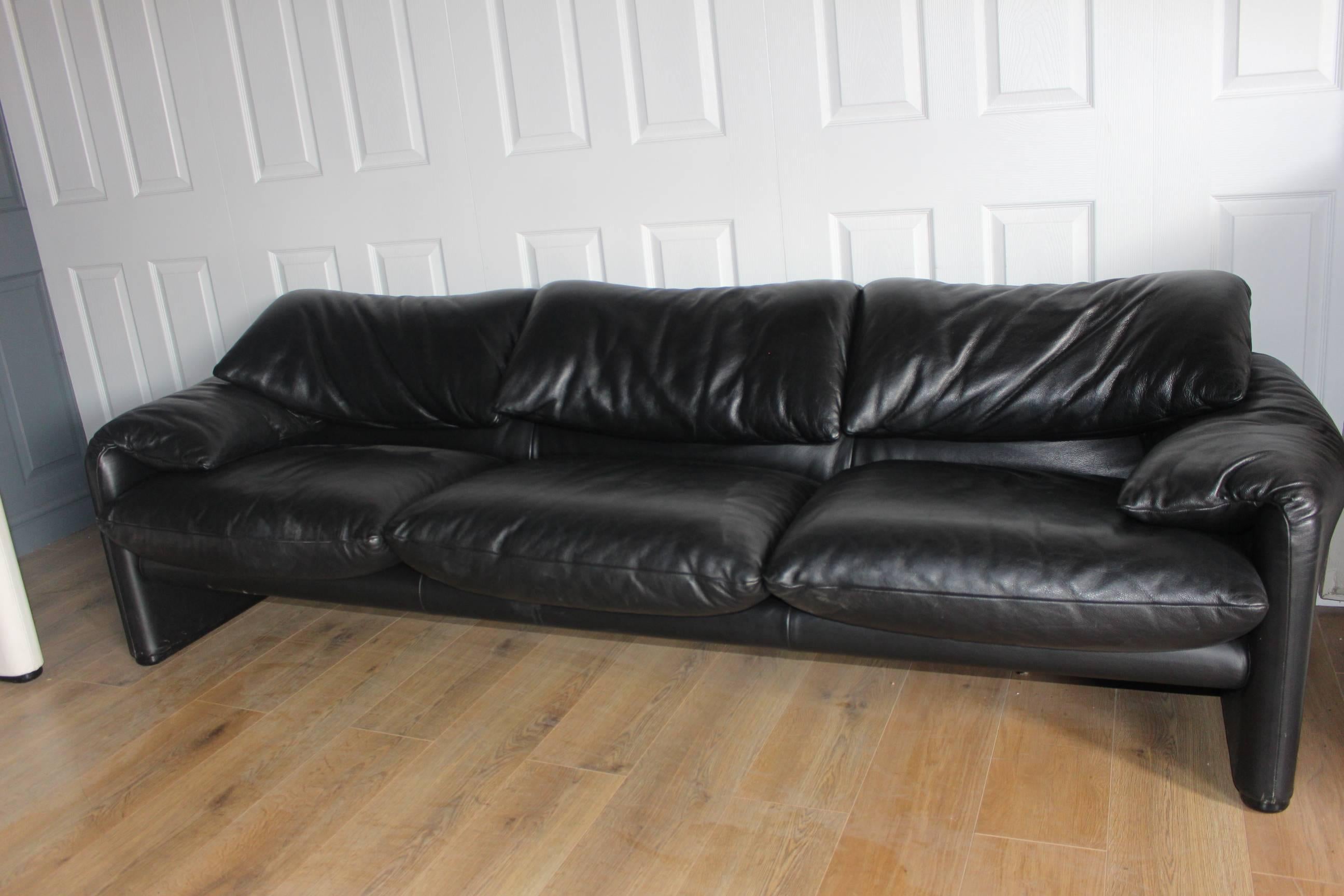 Designer Cassina Maralunga by Vico Magistretti black leather three-seat sofa 
RRP £9072 currently
great quality piece of furniture from well known designer 
very good clean condition
well cared for
head mechanism works fine
iconic design

The