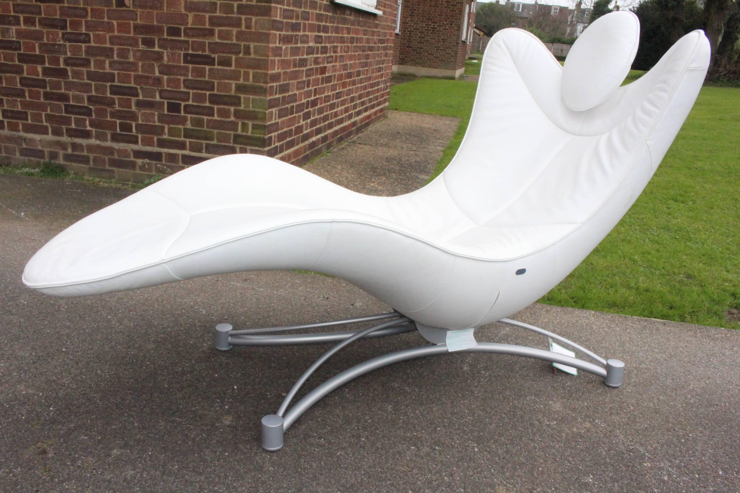 Designer De Sede 151 chaise white leather armchair costs new £6000
well cared for and in very good condition
stylish 

The reclining human silhouette is translated into a form which represents the visual epitome of relaxation. 

As the chair