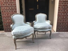 Pair of Louis XV Grey Painted Bergères, circa 1770, Stamped G. Peridiez