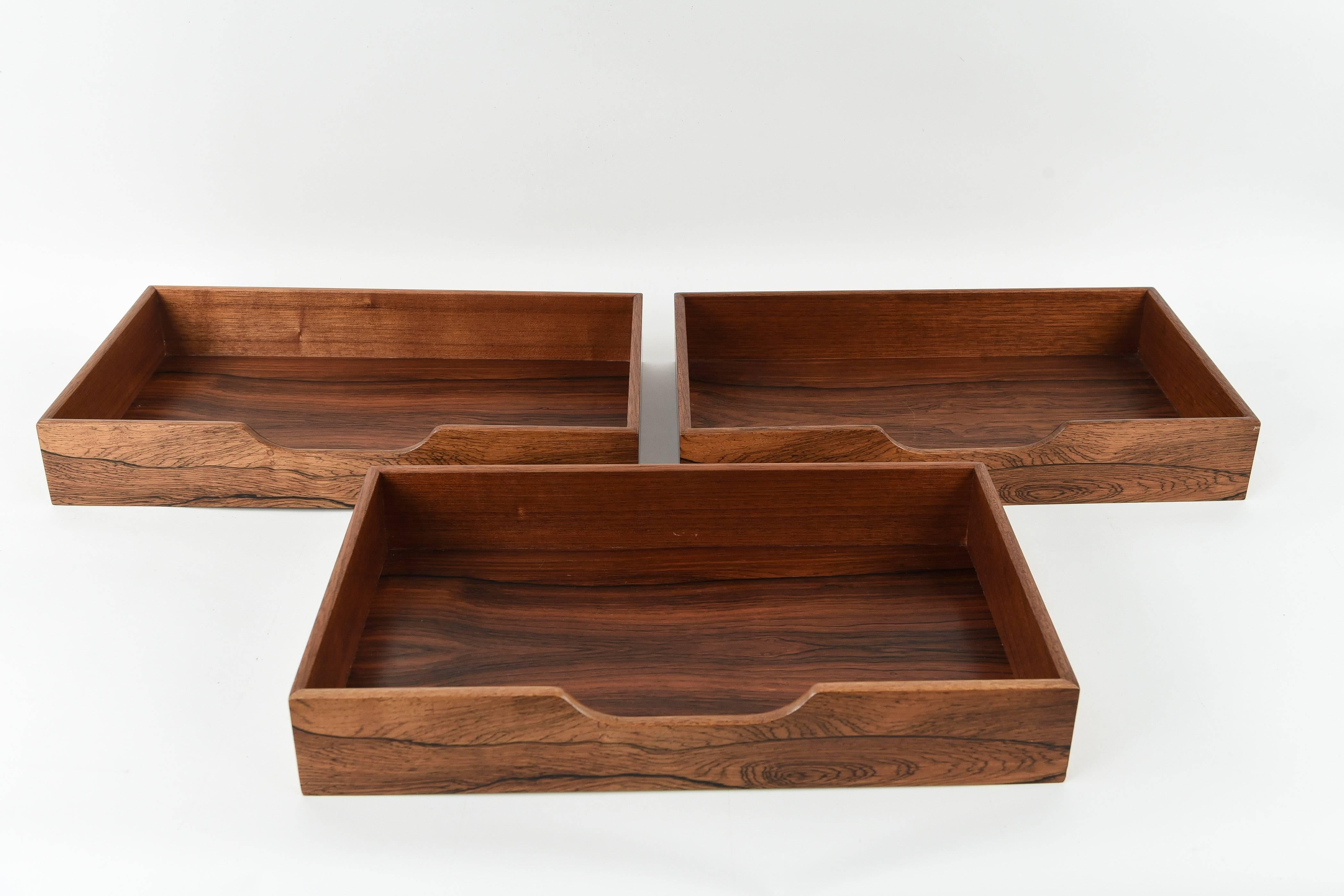 A wonderful grouping of three rosewood desk organizers ready to accent your work space!