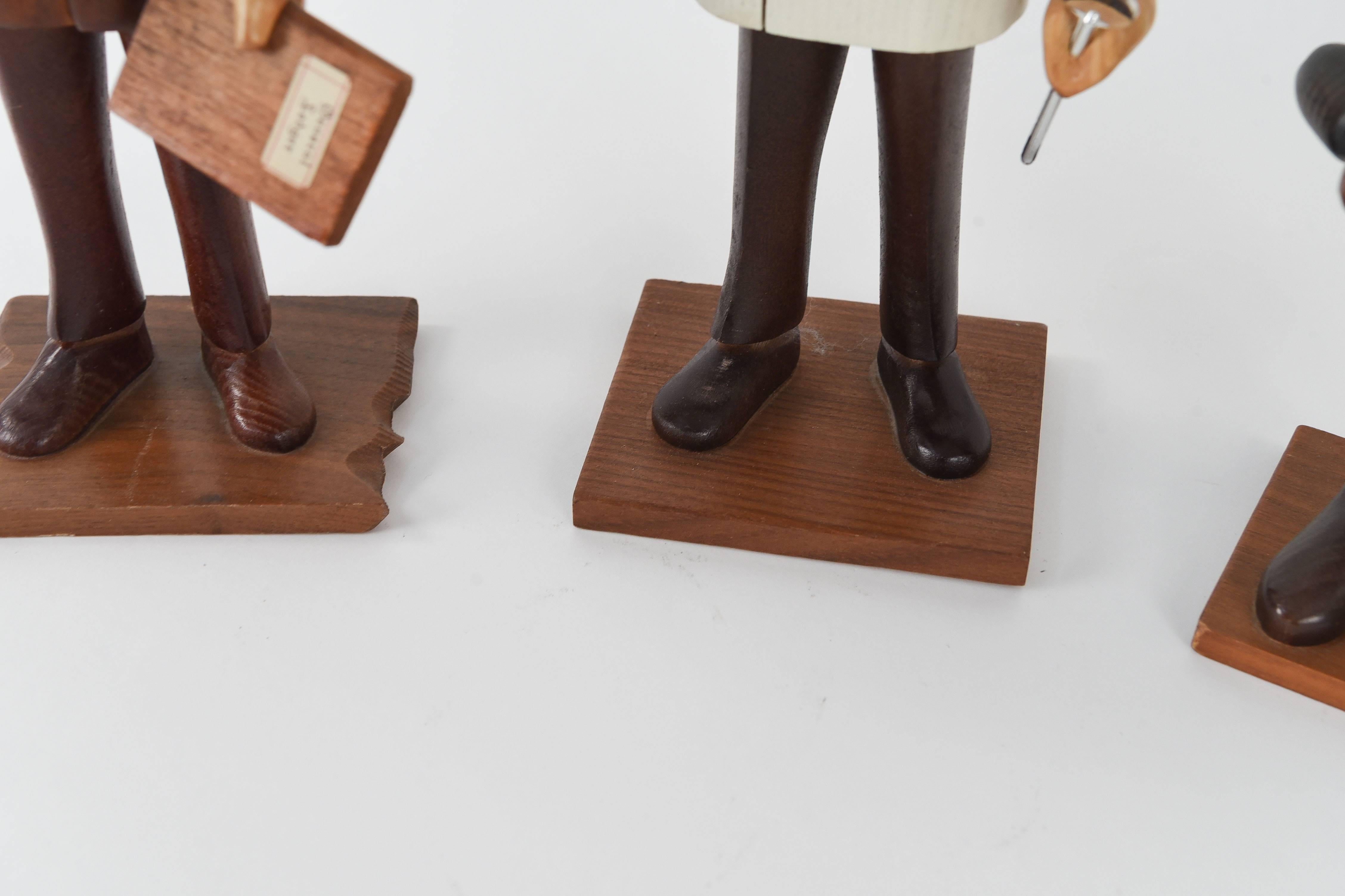 Four Italian Hand-Carved Wooden Occupational Figures 1