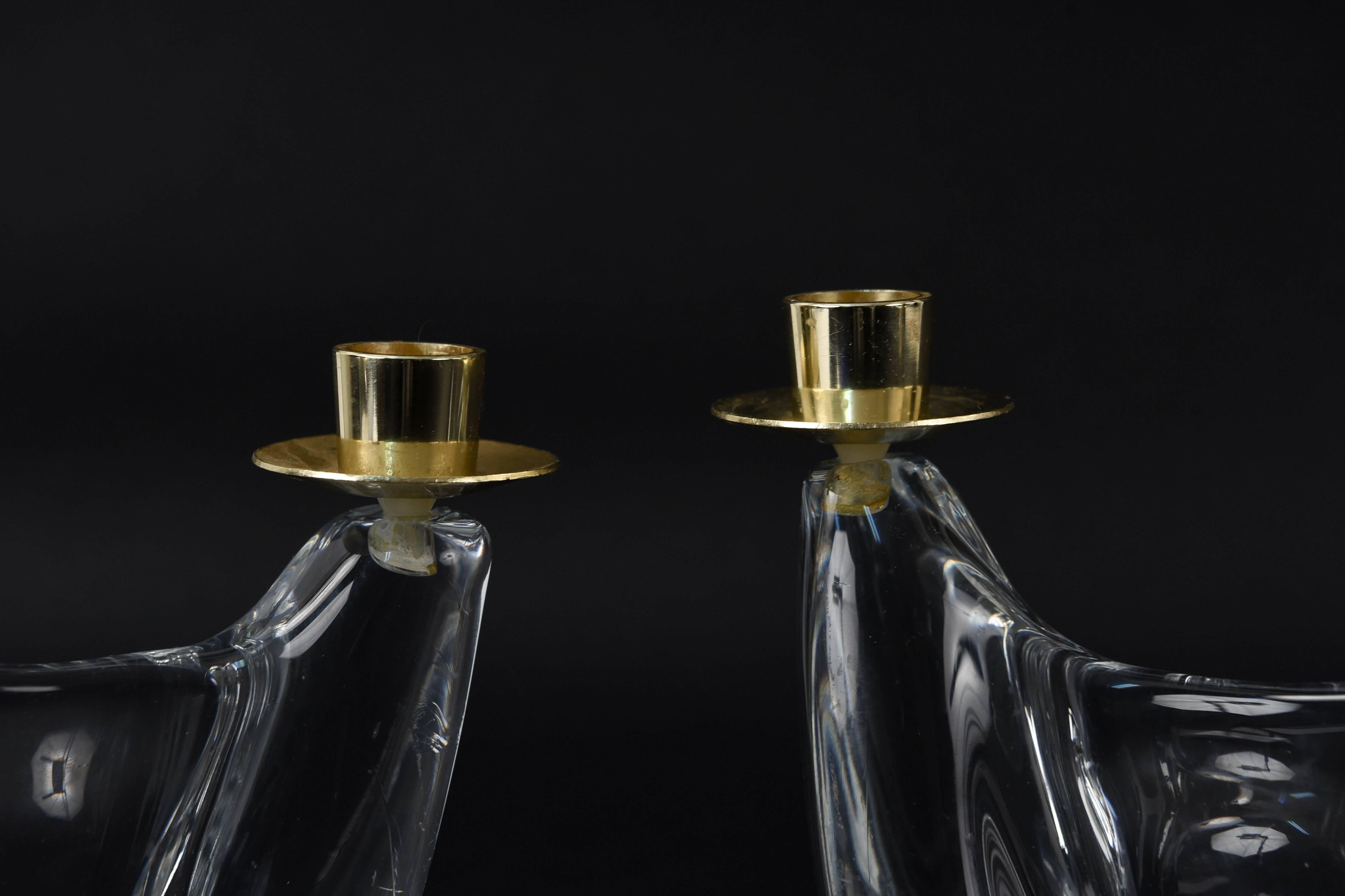 A really nice pair of abstract modern candlesticks, these timeless crystal works of art will be the delight of any table.
