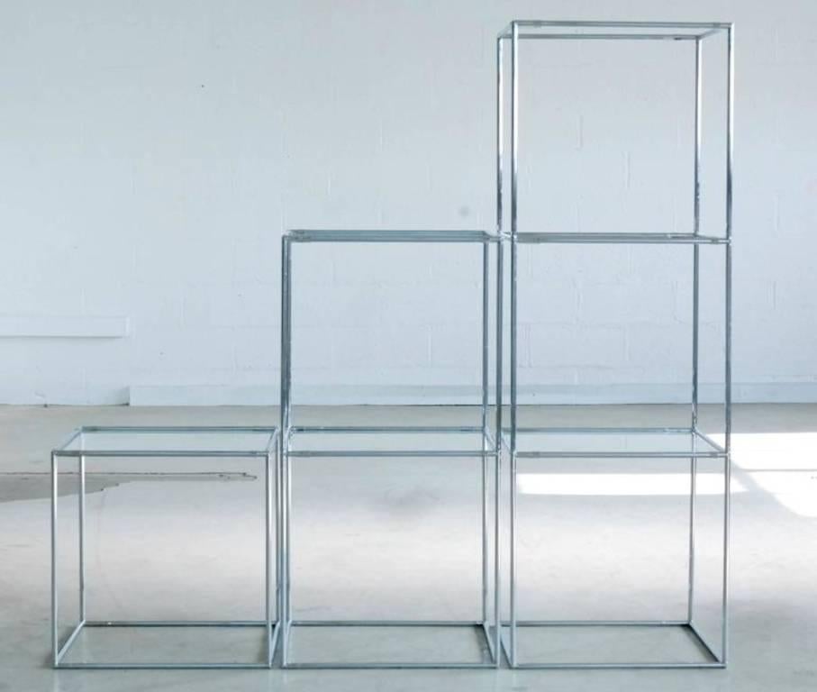 Very nice modern shaped 'Abstracta' shelving system designed by Poul Cadovius produced by Royal System, Denmark, in the 1960s. We see this system from time to time in black lacquer but this set is in a more rare chrome version with clear glass