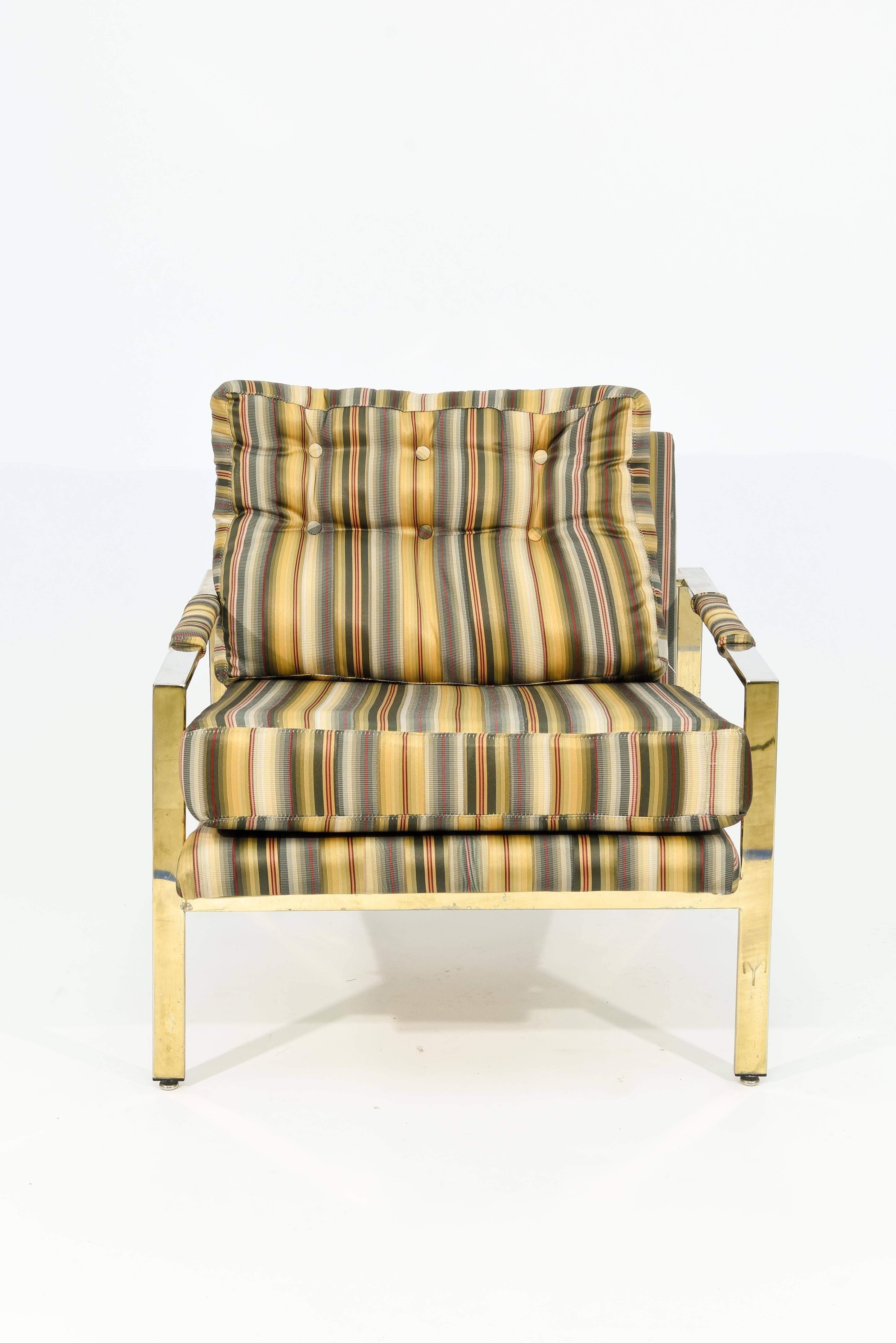 This chrome base lounge chair was designed in the 1970s by Milo Baughman for Thayer Coggin. Featuring retro upholstery and stunning chrome, this lounge chair makes for a comfortable and stylish seat.