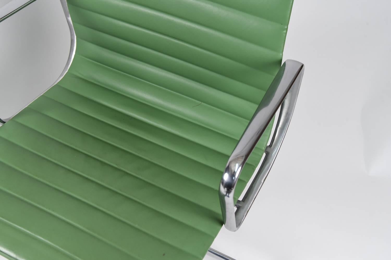 20th Century Pair of Eames for Herman Miller Aluminum Group Chairs in Apple Green Leather