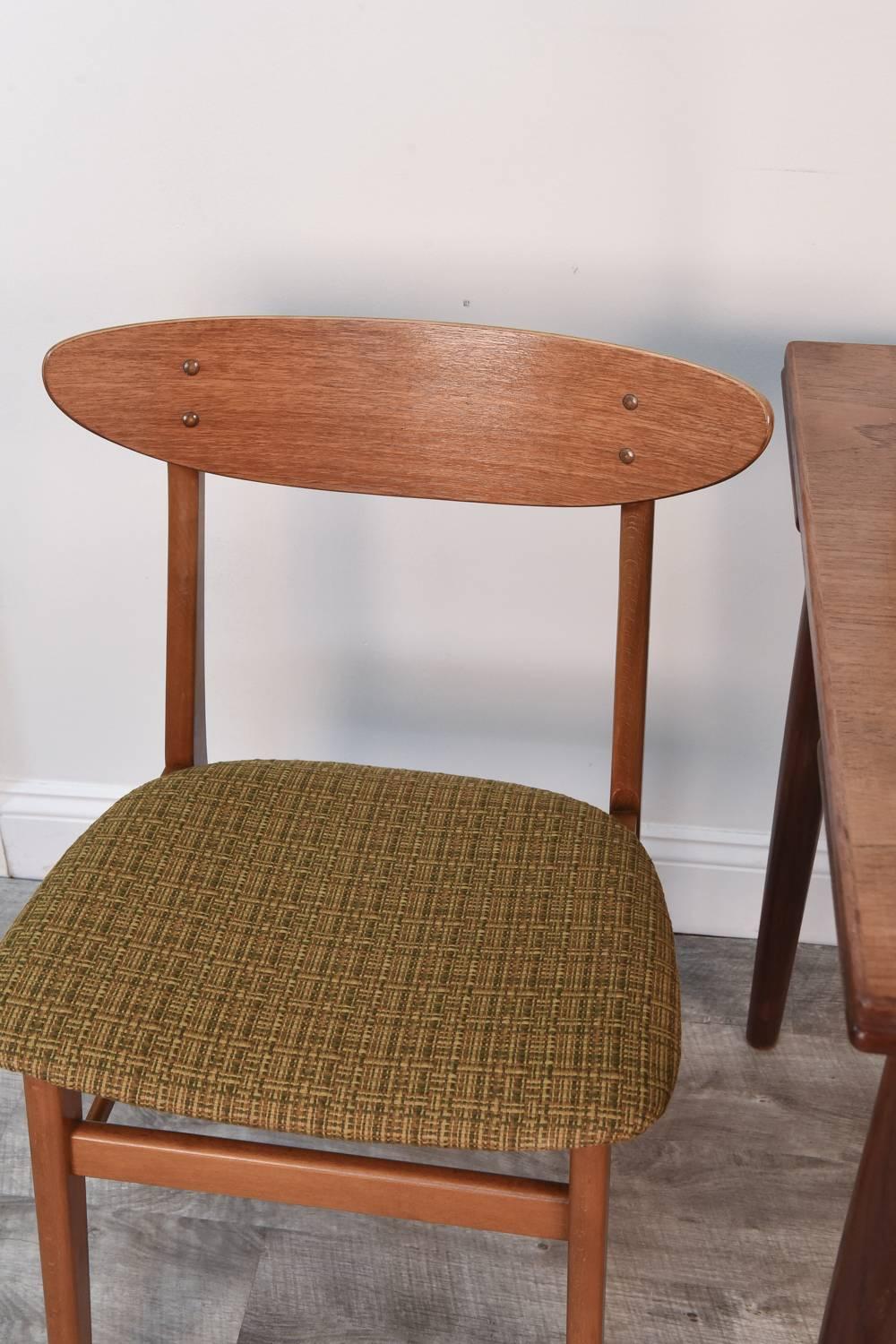 A nicely matched set of Danish teak table and chairs!