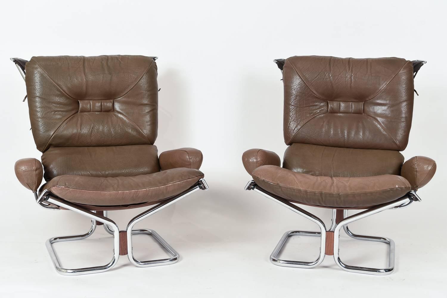 A beautiful and comfortable pair of sling chairs by Harald Relling. These iconic Danish chairs will be the focal point in any room.