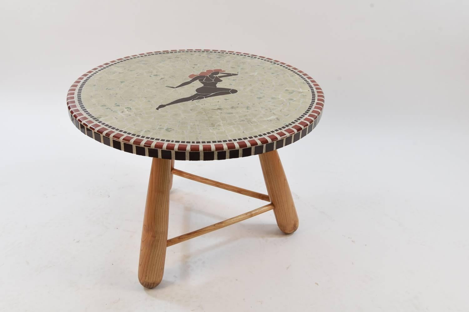 An amazing piece of art turned into a functional piece of furniture, this mosaic masterpiece features a bathing beauty designed in tile on the top. This coffee table is a wonderful example of Otto Færge’s work with the distinguishing baseball bat