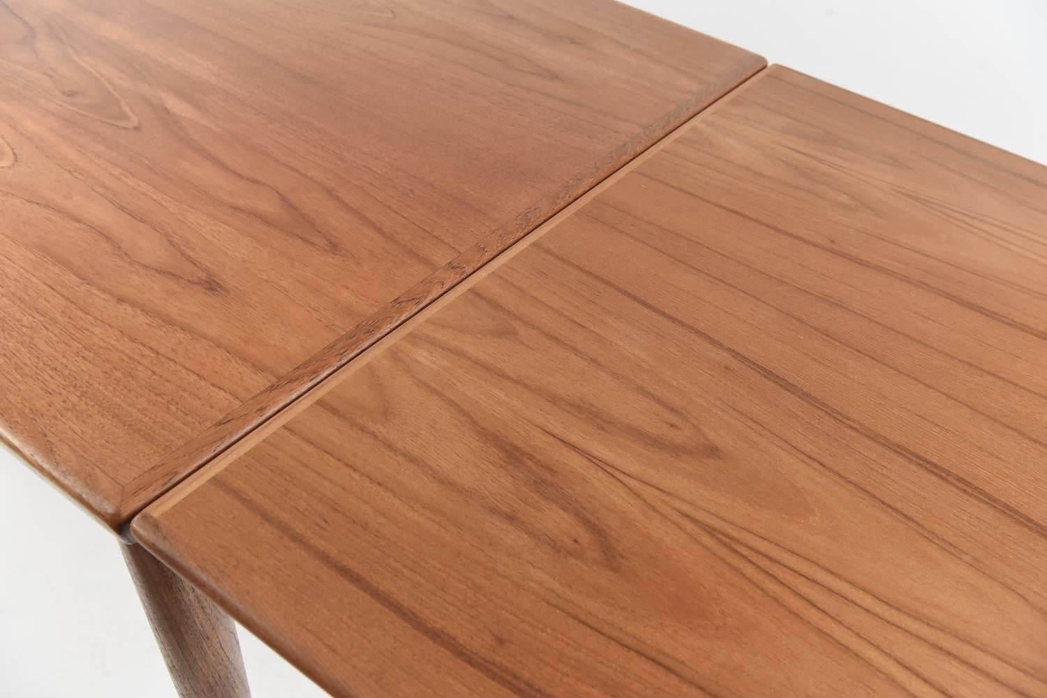 mid century teak dining table