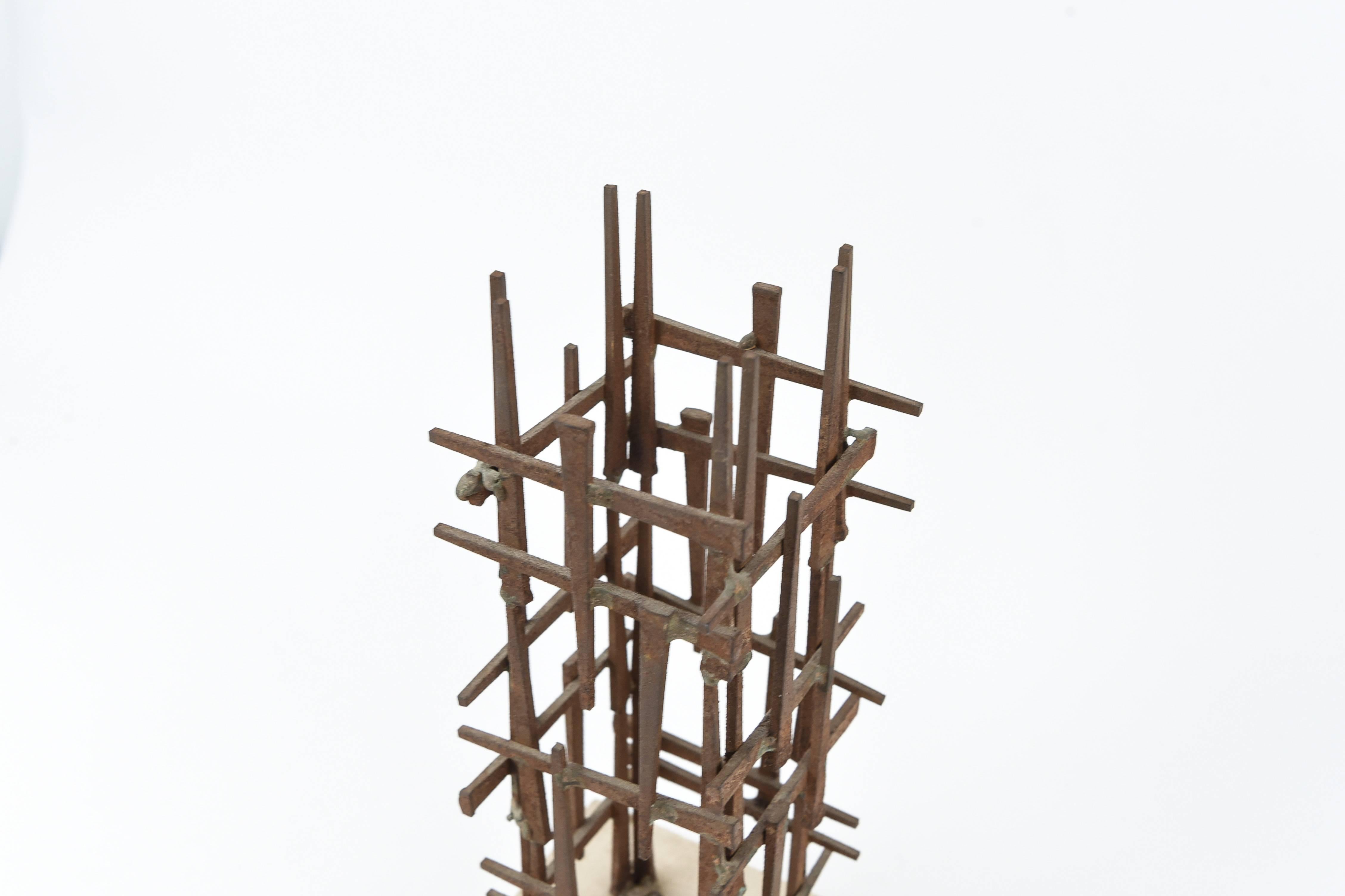 Untitled (steel nails mounted ). With initials SC and copyright symbol on marble base, circa 1970s. An interesting sculpture crafted of flat head iron nails welded into a vertical structure.