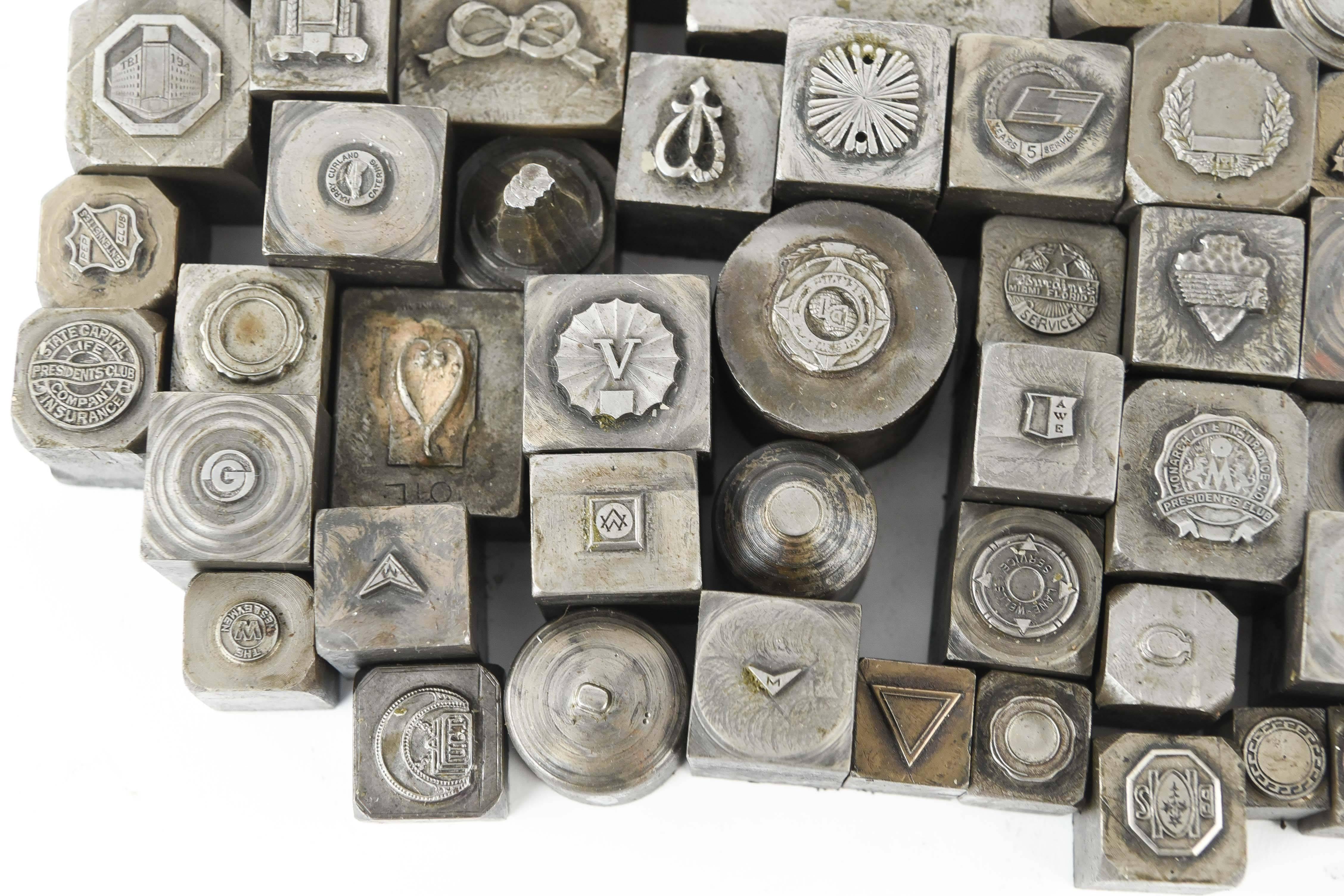 Antique solid steel alloy stamps from a press that made jewelry like tie tacks and pins etc.