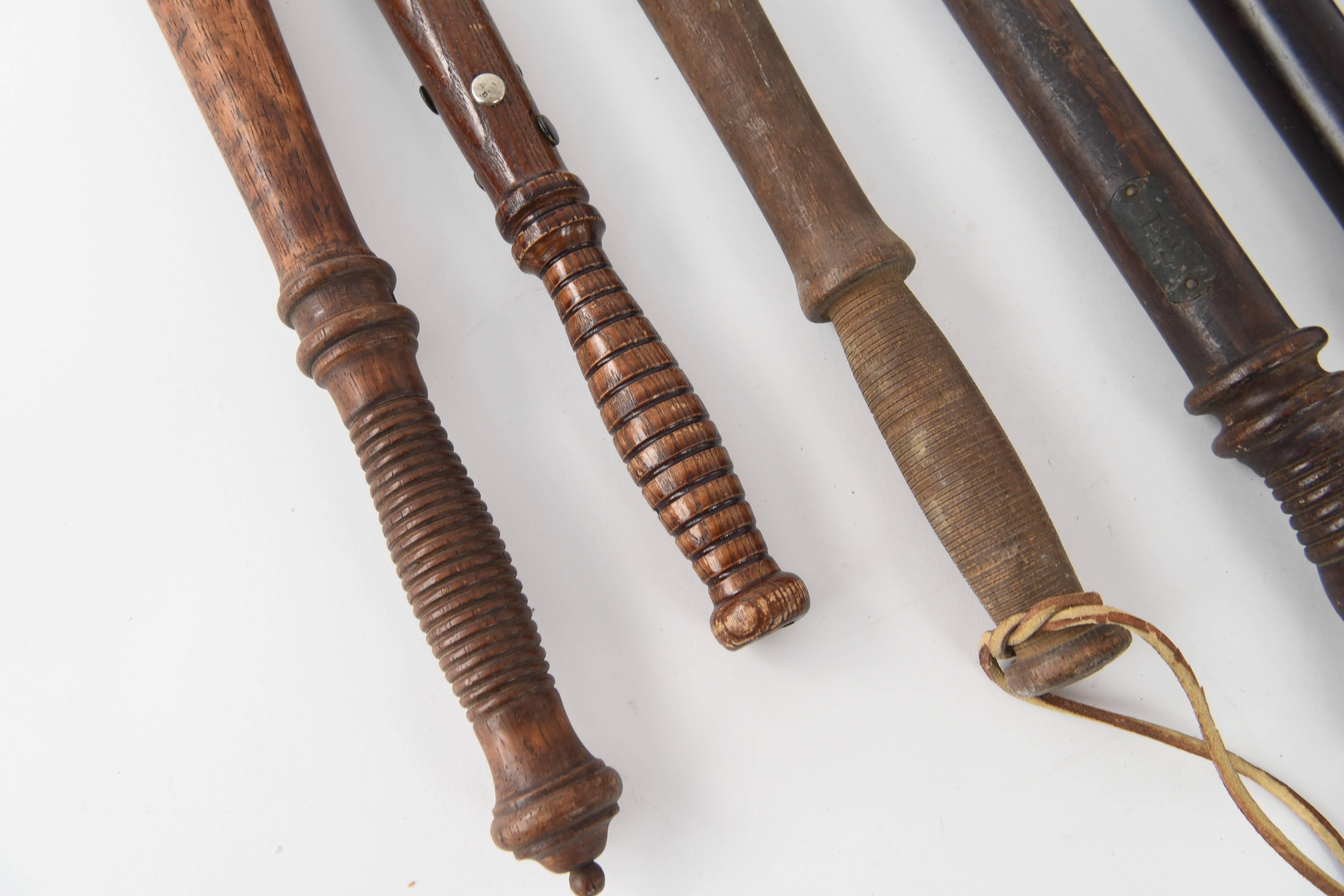 A very neat assembled collection of different batons, mostly used by law enforcement at the turn of the century.