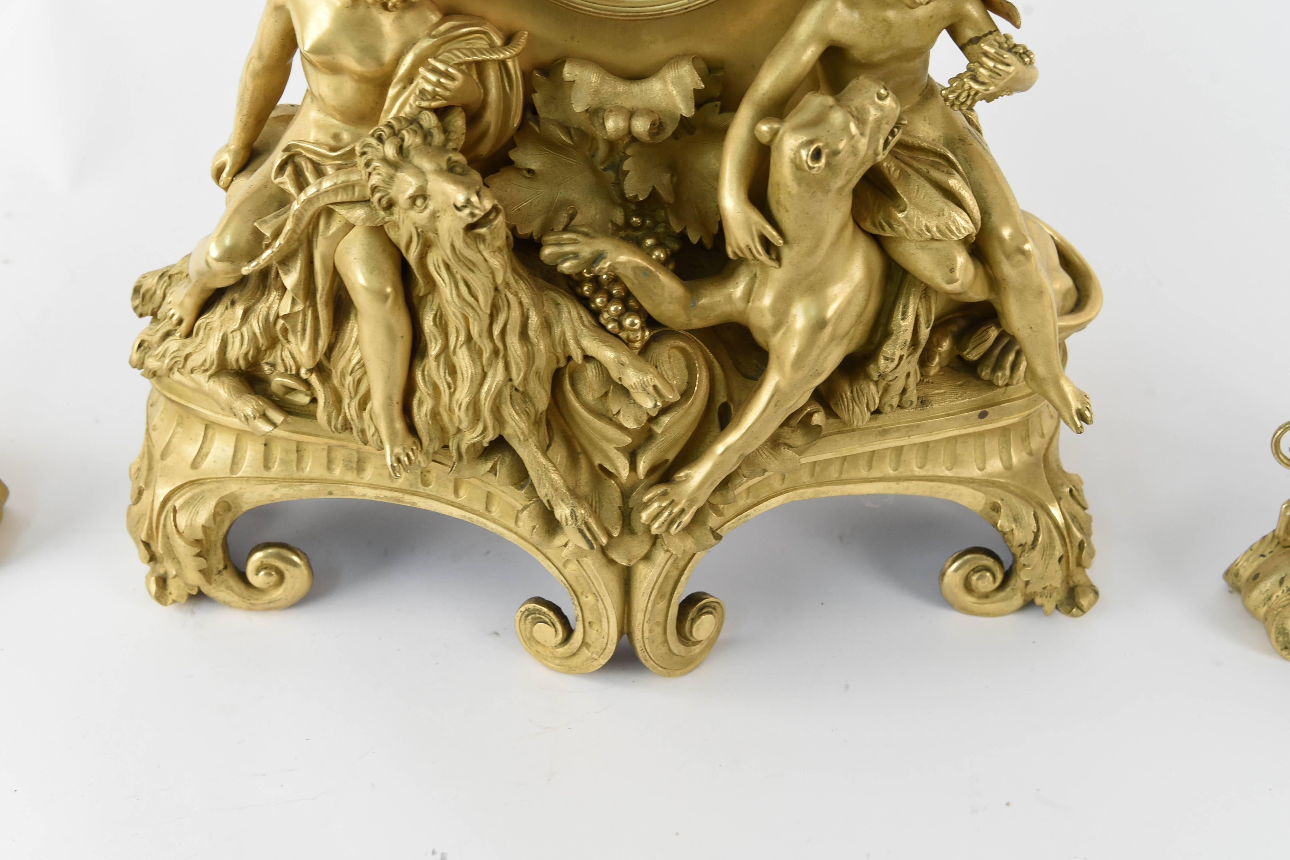Bronze 19th Century French Gilt Figural Clock Set For Sale