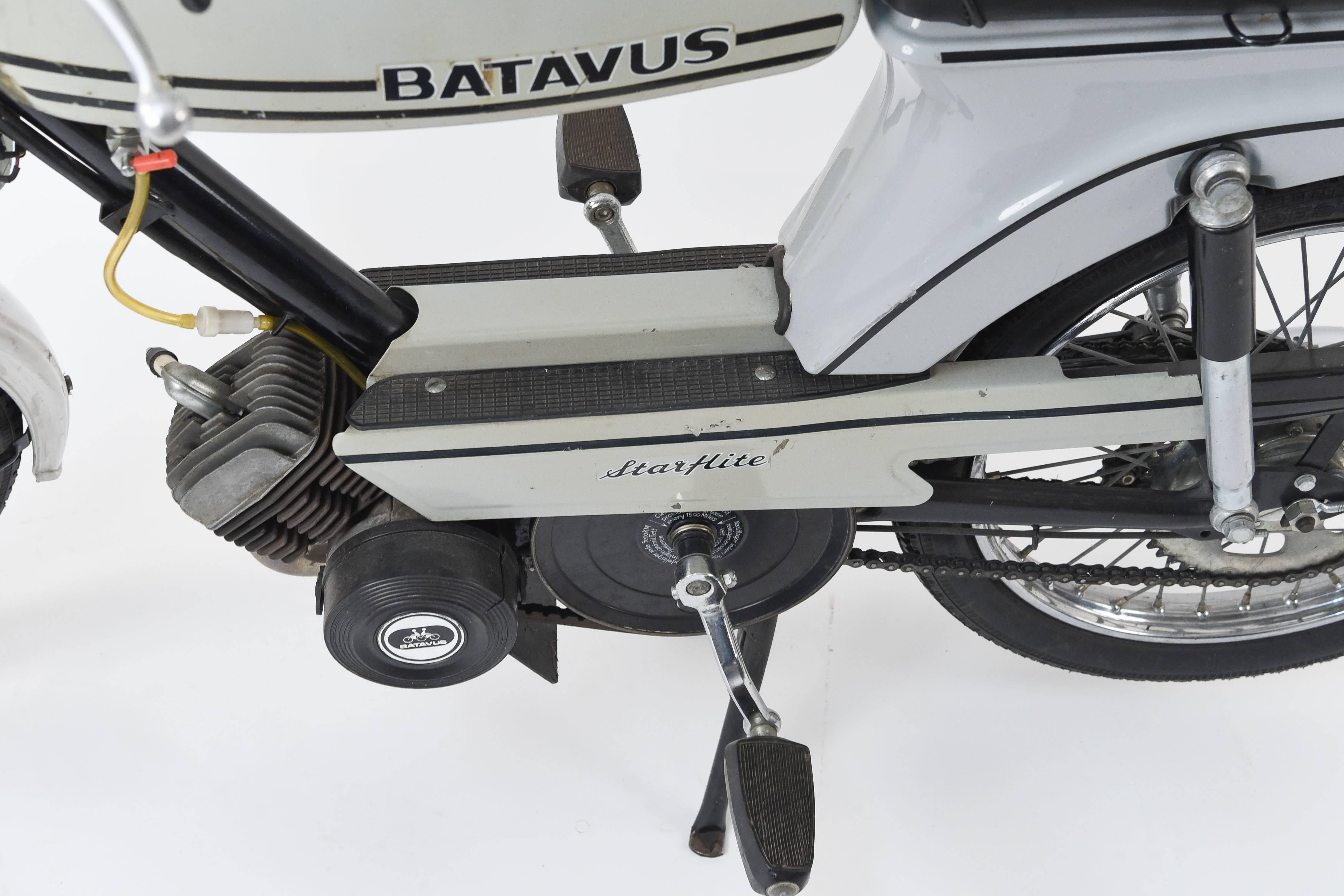 Travel in style with this Batavus Starflite moped! In working condition, but in need of tune up. Can be used as a moped or fun decorative prop for an interior.