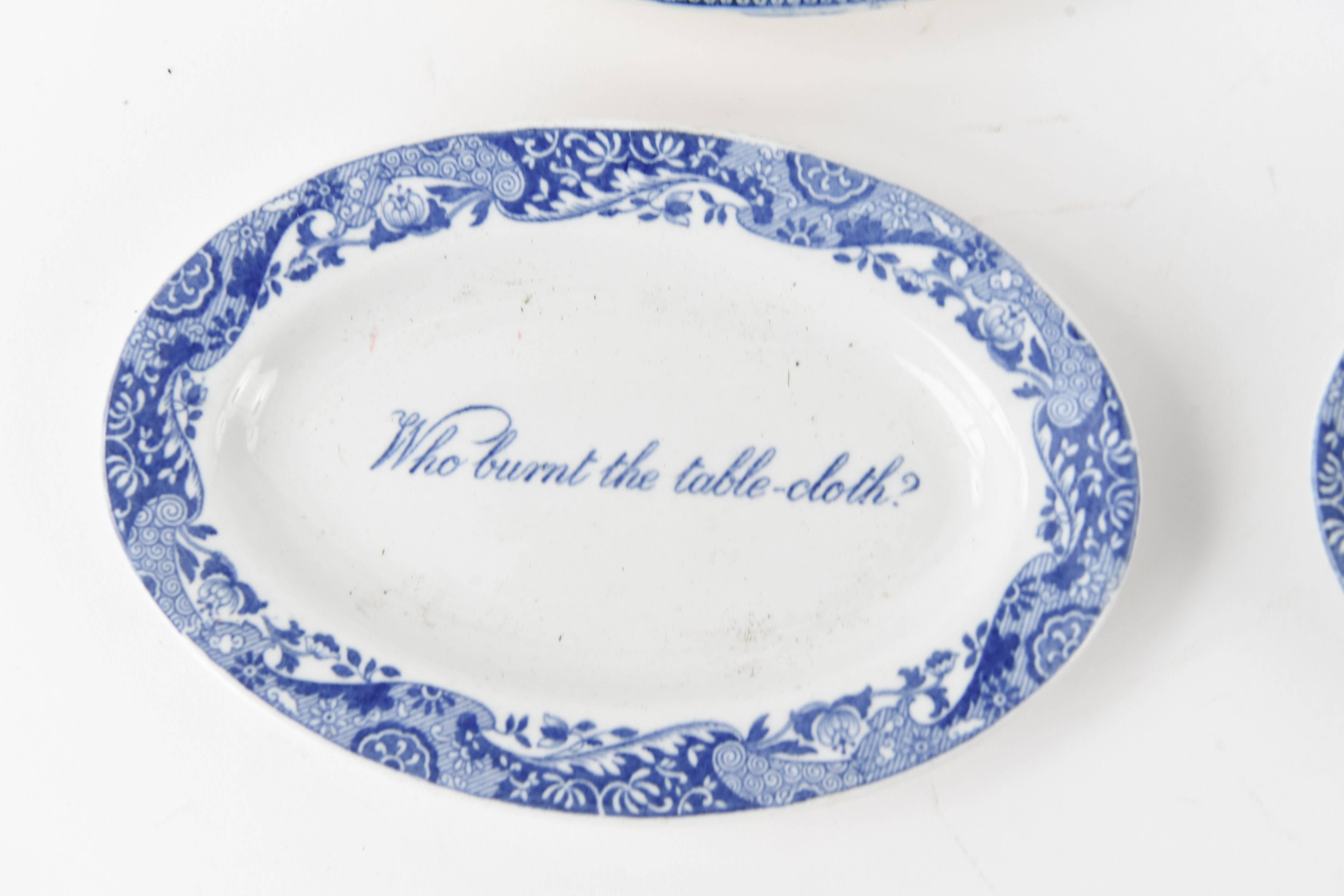 A set of three Spode Italian blue transfer ware miniature dishes depicting the humorous phrase 