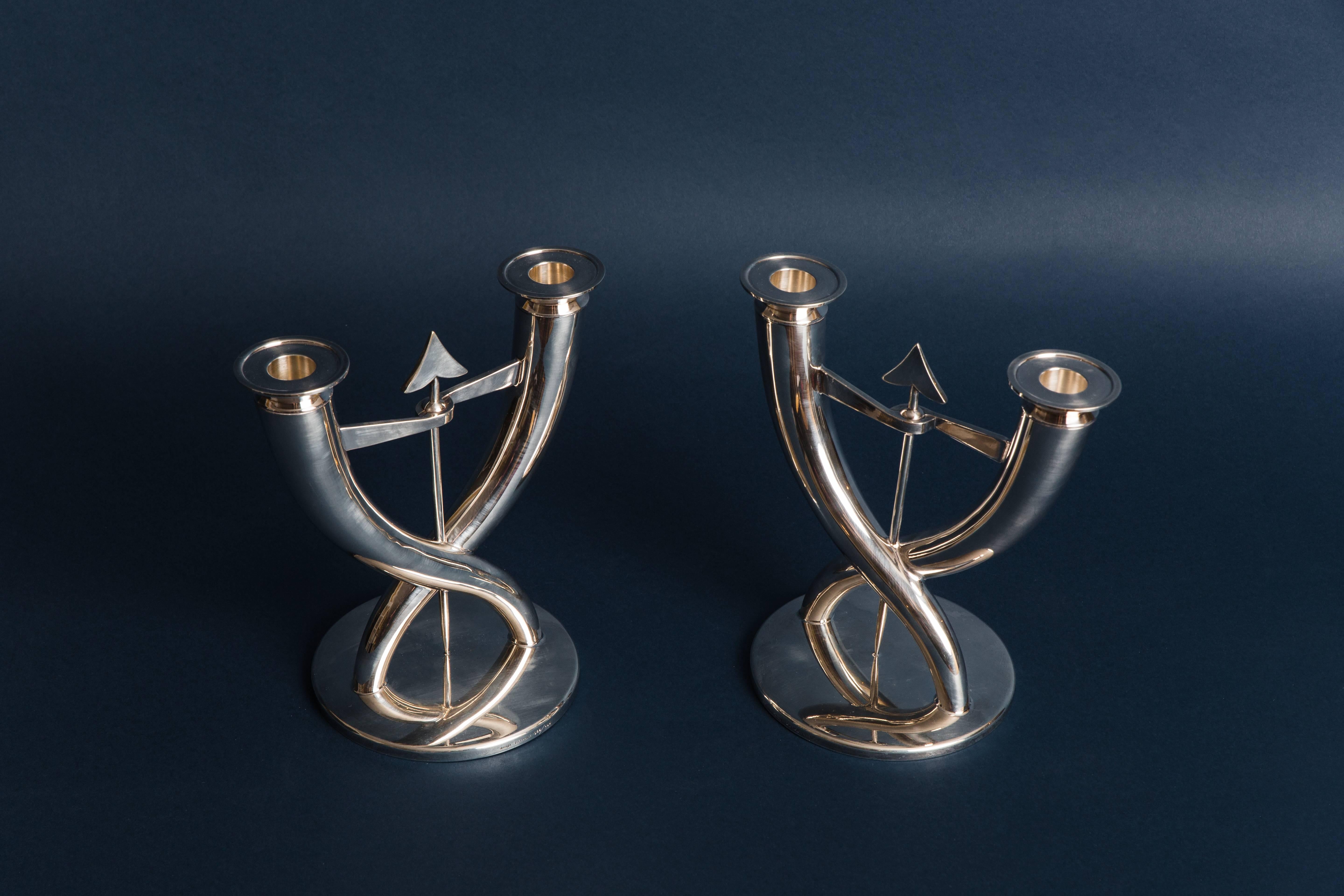 Silver plated candelabra designed in 1926 by Gio Ponti for Christofle and reissued in late 20th century in an edition of 200. Stamped design 'Gio Ponti' & 'Christofle France' with hallmarks and numbered '066' & '067.'

Literature:
Lisa Licitra