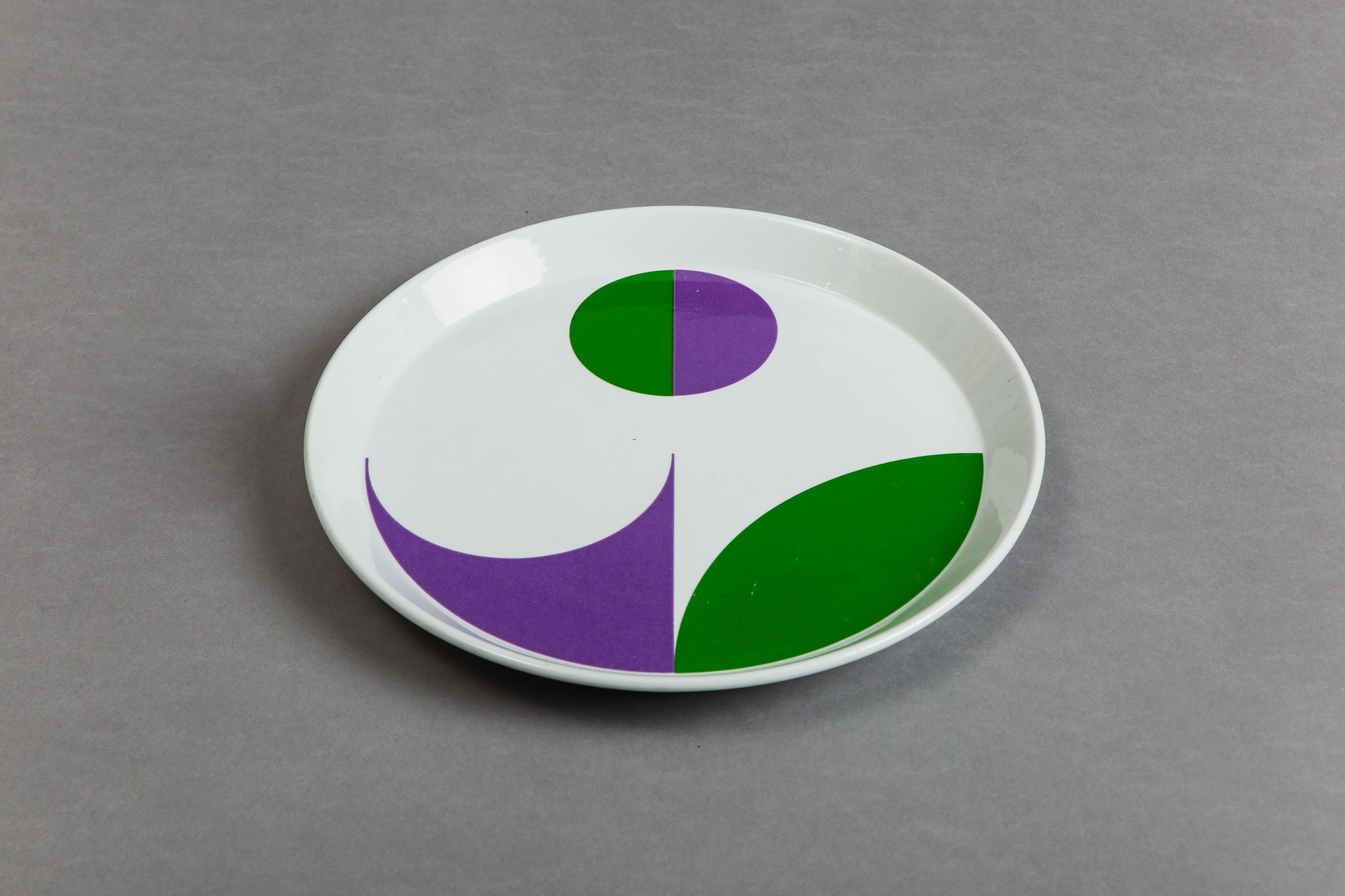 Gio Ponti for Ceramica Franco Pozzi glazed porcelain plates, Italy, circa 1967. Single earlier plate with simple element and later three plates with complex elements deriving from the intersection of circles in positive and negative. Signed with