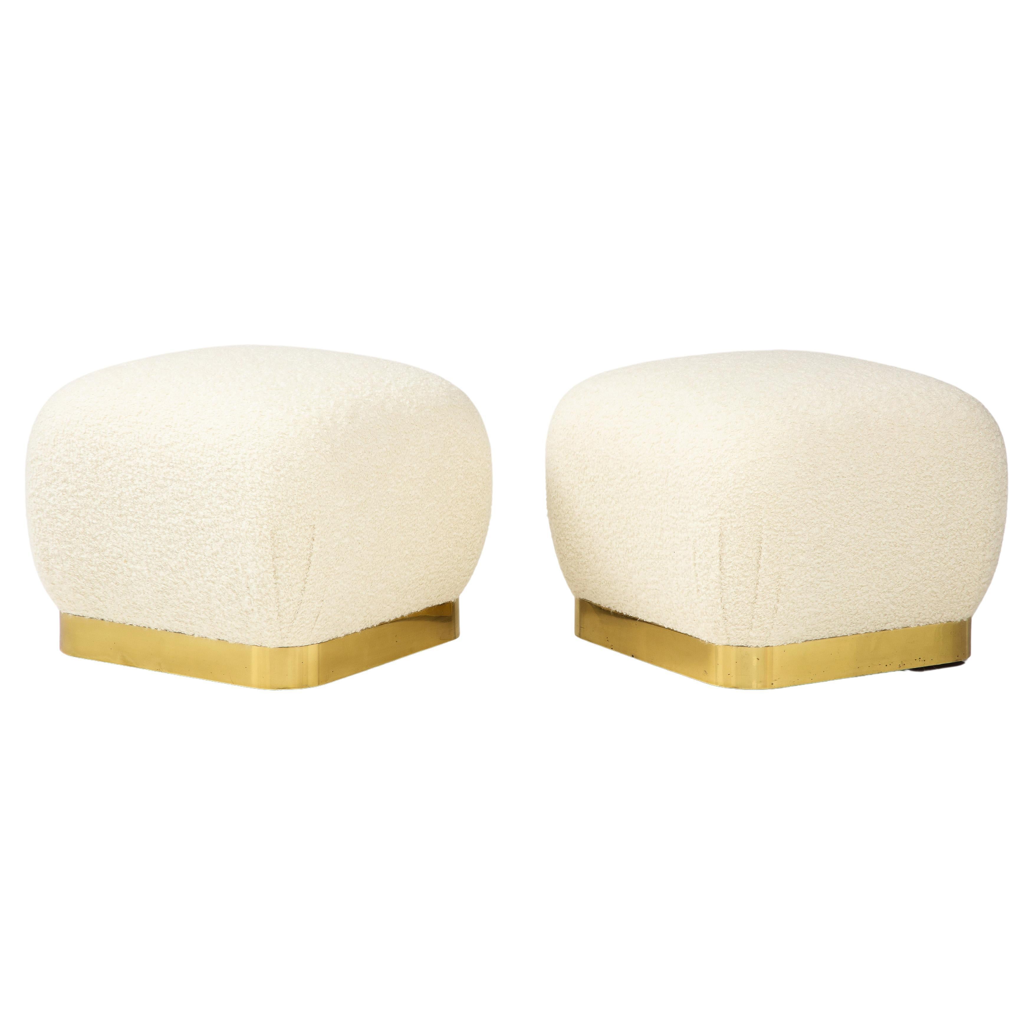 Polished Karl Springer Pair of Souffle Ottomans in Ivory Bouclé and Brass, 1980s For Sale