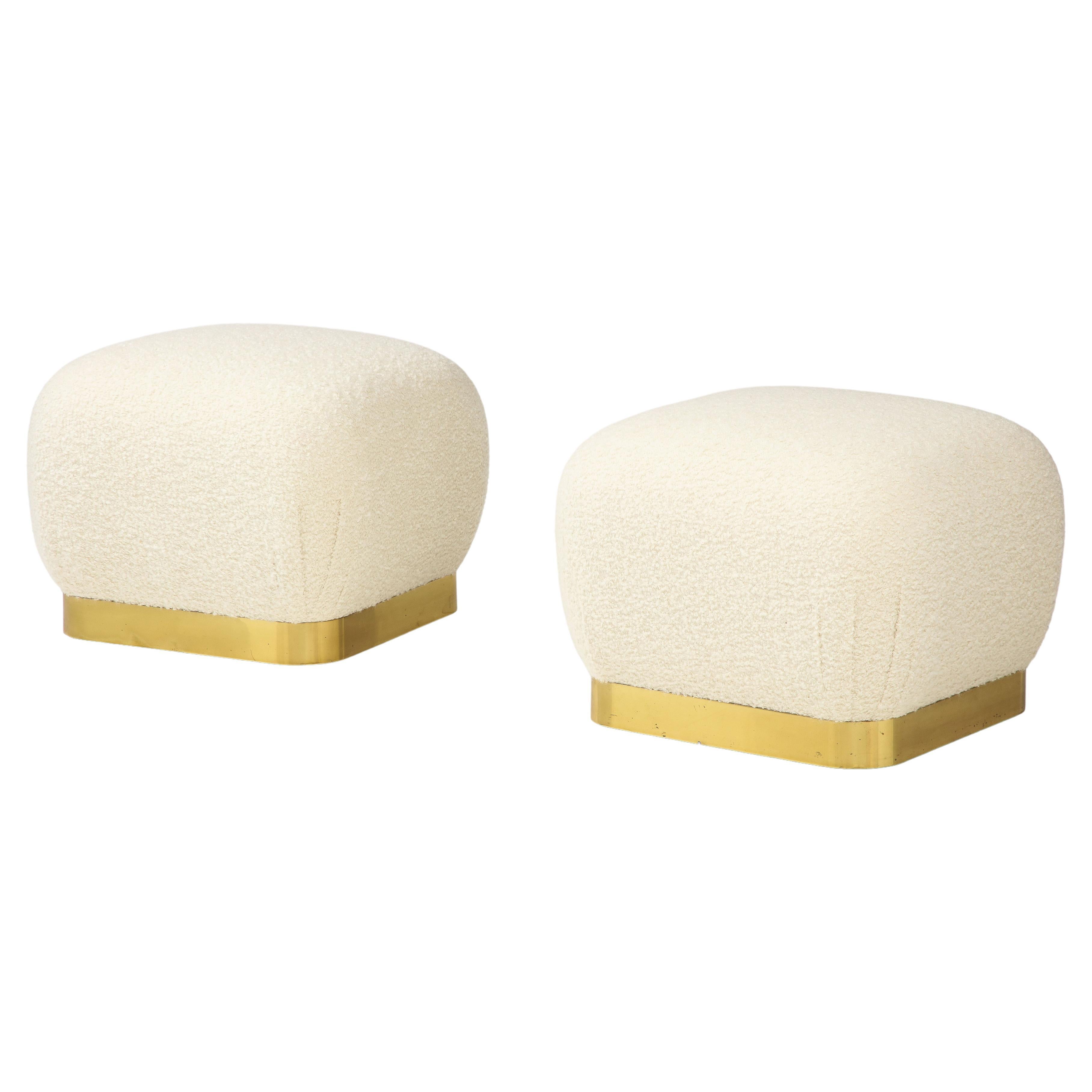 Karl Springer Pair of Souffle Ottomans in Ivory Bouclé and Brass, 1980s For Sale
