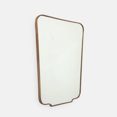 Grande specchio da parete in ottone di stile modernista italiano della metà del secolo, di forma rettangolare, anni '50