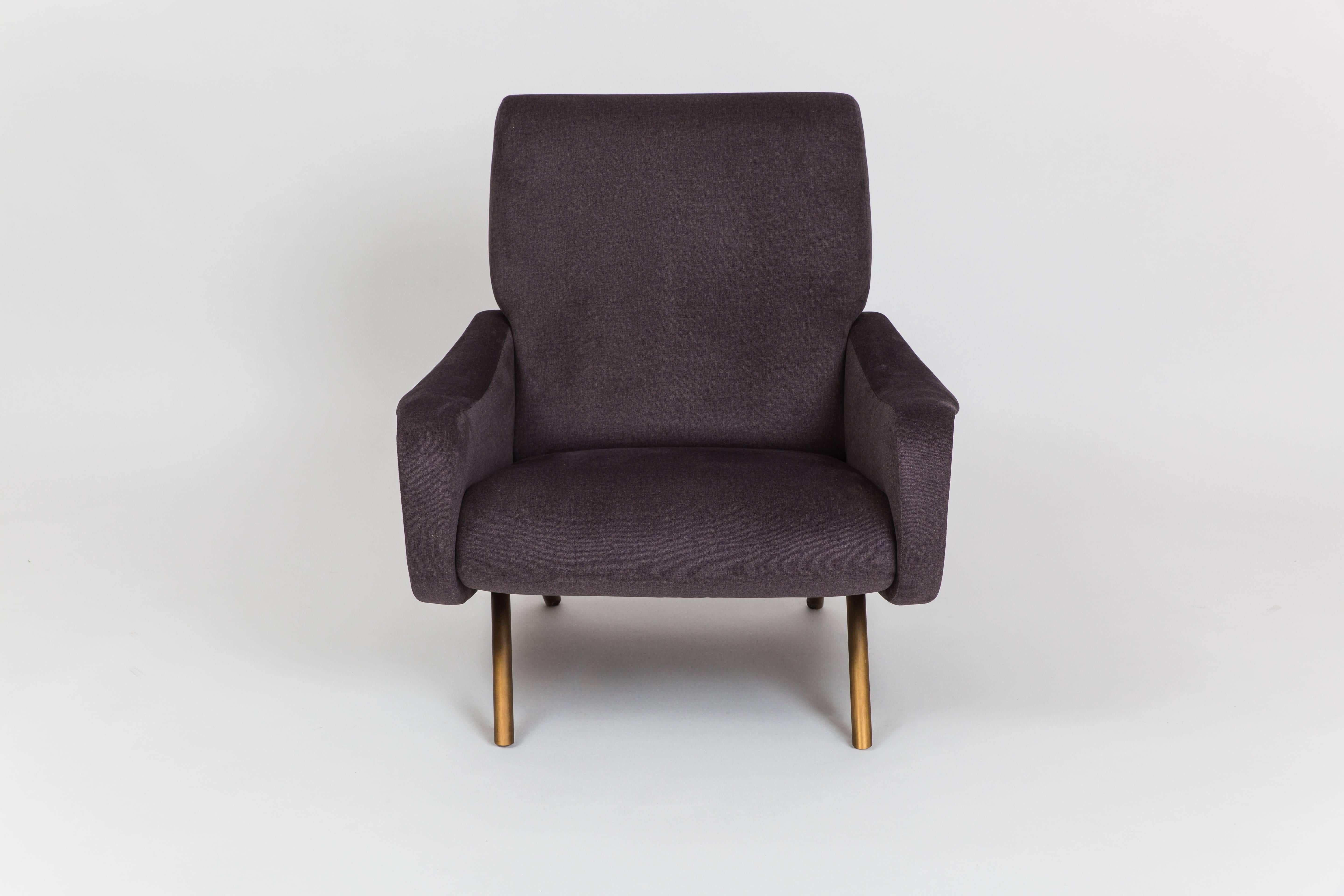 Marco Zanuso for Arflex early pair of ‘Lady’ chairs or lounge chairs with steel structure, foam rubber seat and back upholstered in charcoal gray cotton velvet, and tubular brass legs, Italy, 1950s. This model is a sleek, iconic design and was