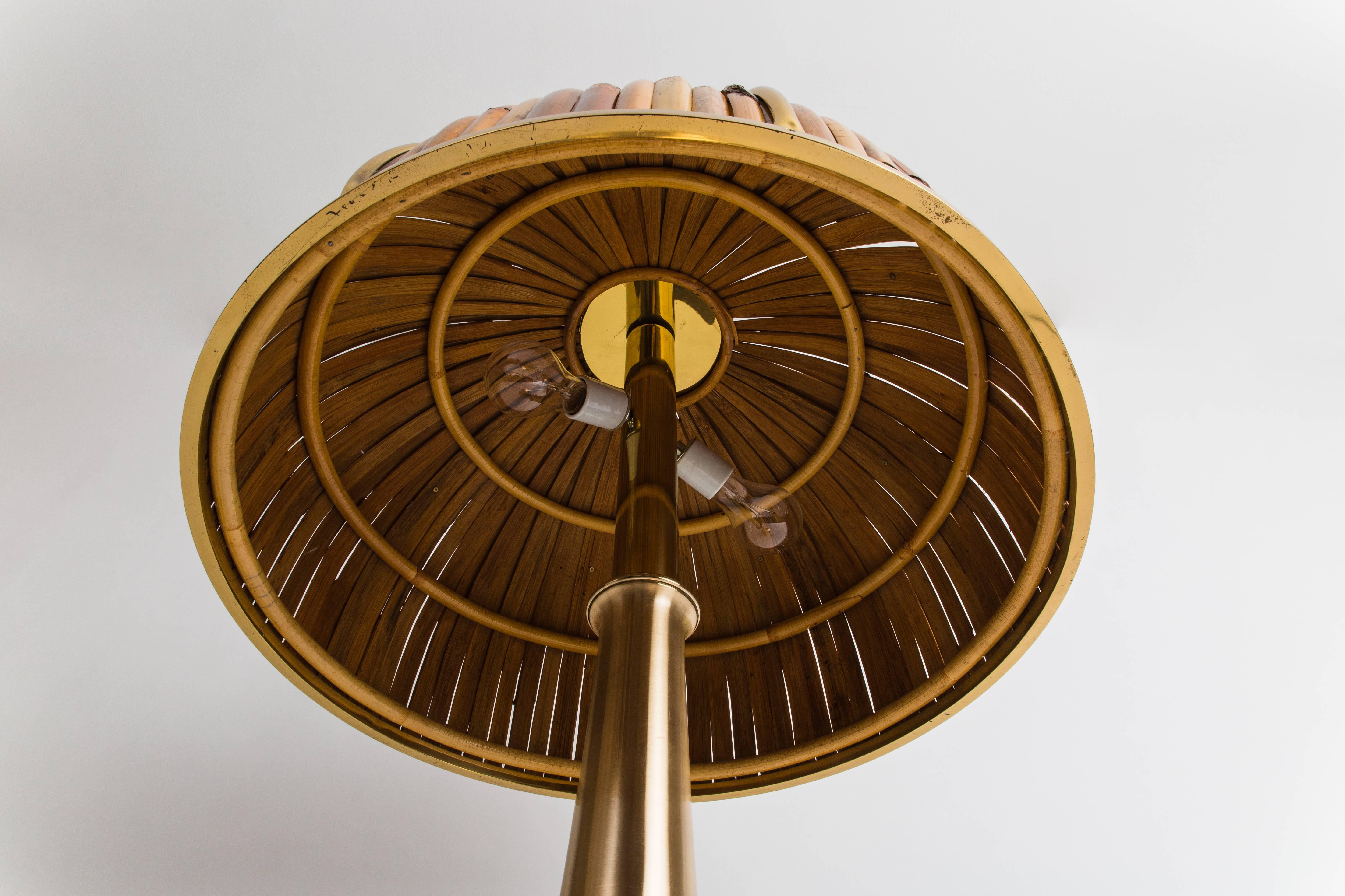 Large table lamp with bamboo and brass shade and elegant brushed gold finished brass base. Impressed signature and artist’s cipher to shade and base 'Gabriella Crespi'. Rewired to U.S. standards.

Literature:
Patrick Favardin and Guy