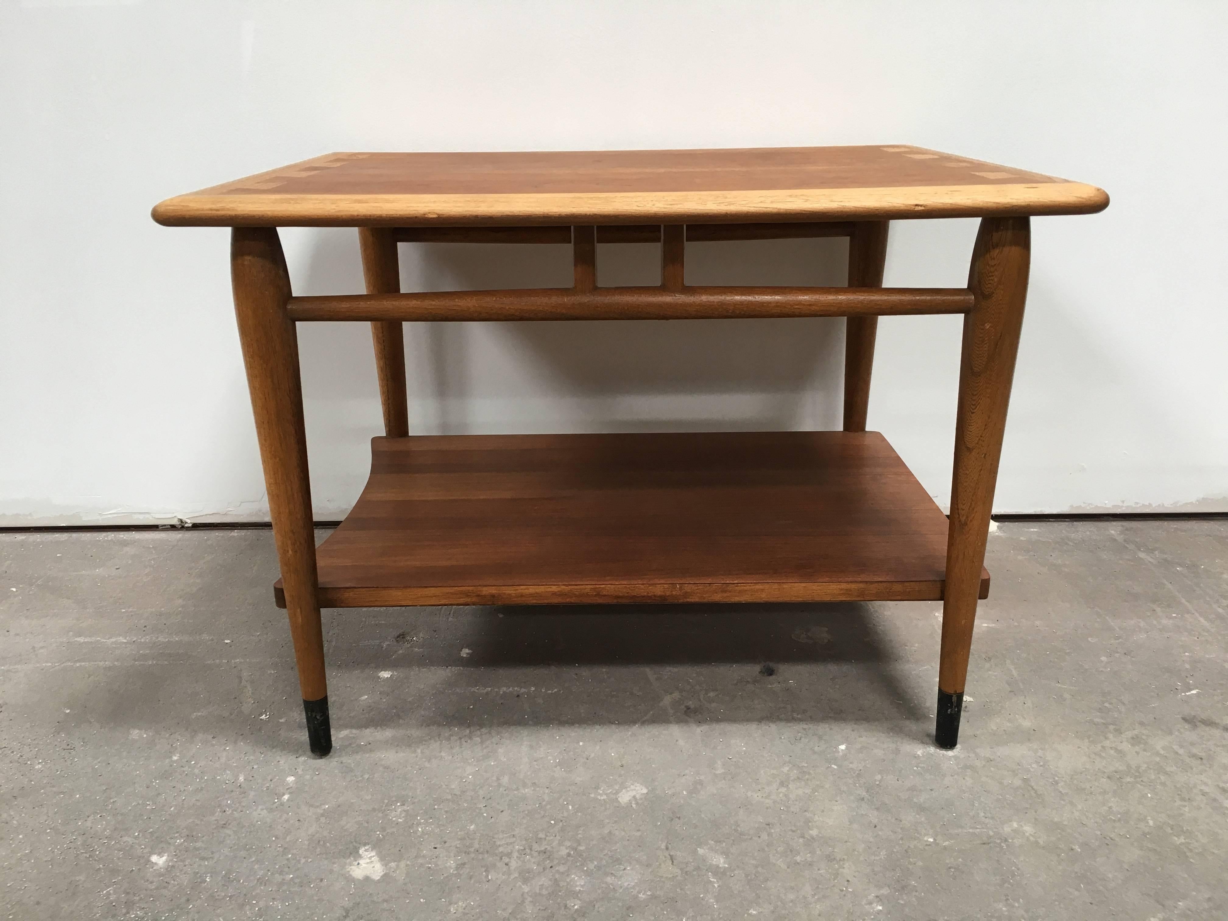 Midcentury Lane Acclaim end table with beautiful dovetailed wooden top and pencil legs.