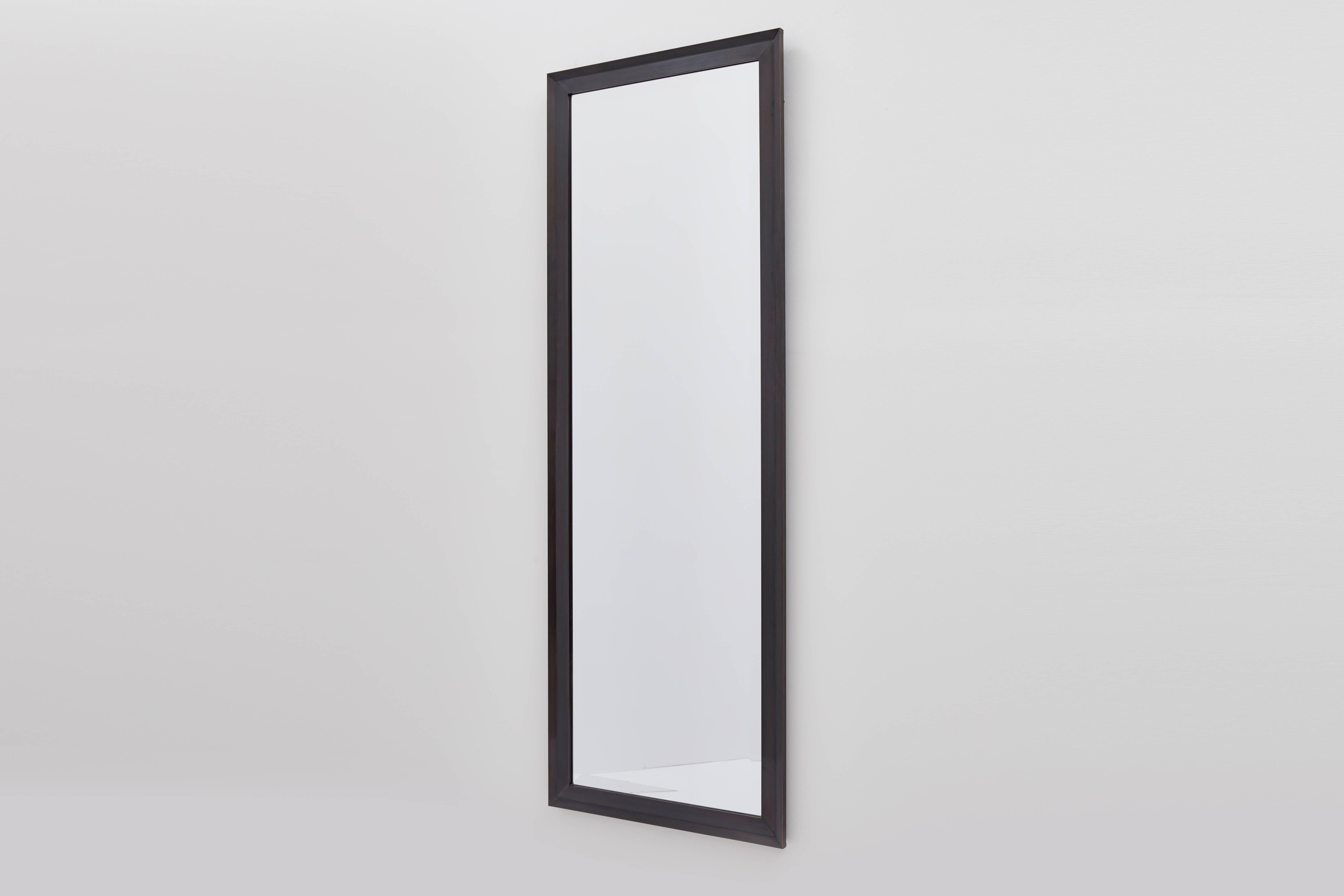 The blue point mirror, designed and built by Bark Frameworks, is a clean, versatile profile that can be made to almost any specification, and looks stunning in a variety of finishes and treatments. The mirror shown here is maple clad in copper with