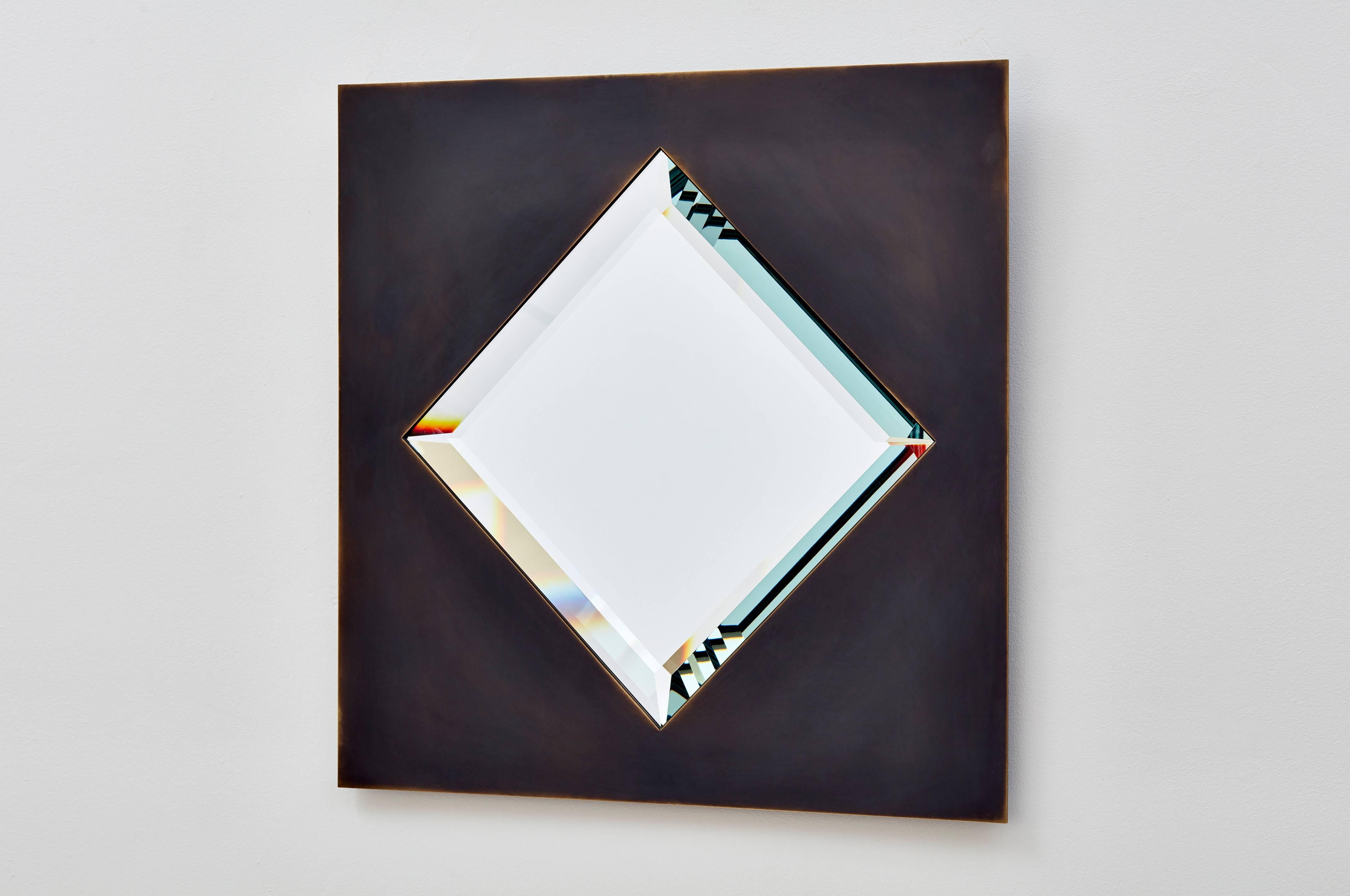 Bark Frameworks created this custom mirror about 20 years ago, naming it Dakhla after the coastal Moroccan town. The mirror frame is a thick sheet of copper, patinated to a dark sheen -- like the desert in the Western Sahara, it seems to have no