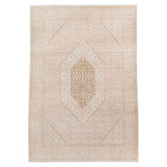 Vintage Tabriz Rug with Soft Blush Field and Ivory Floral Medallion