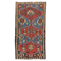 Vintage Turkish Kilim with Stacked Red Medallions on Indigo Blue