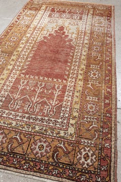 Vintage Anatolian Prayer Rug in Rust Red and Apricot with Tulip Motifs