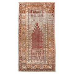 Vintage Anatolian Prayer Rug in Rust Red and Apricot with Tulip Motifs