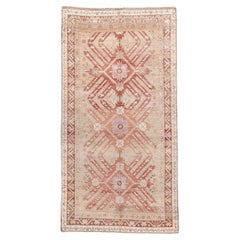 Vintage Caucasian Rug in Coral and Lilac with Radiating Star Medallions