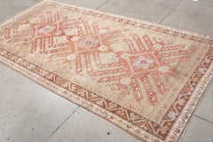 Vintage Caucasian Rug in Coral and Lilac with Radiating Star Medallions