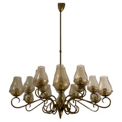 SEGUSO - Lampadario a 18 luci in vetro di murano con polvere d’oro. ITALIA 1950