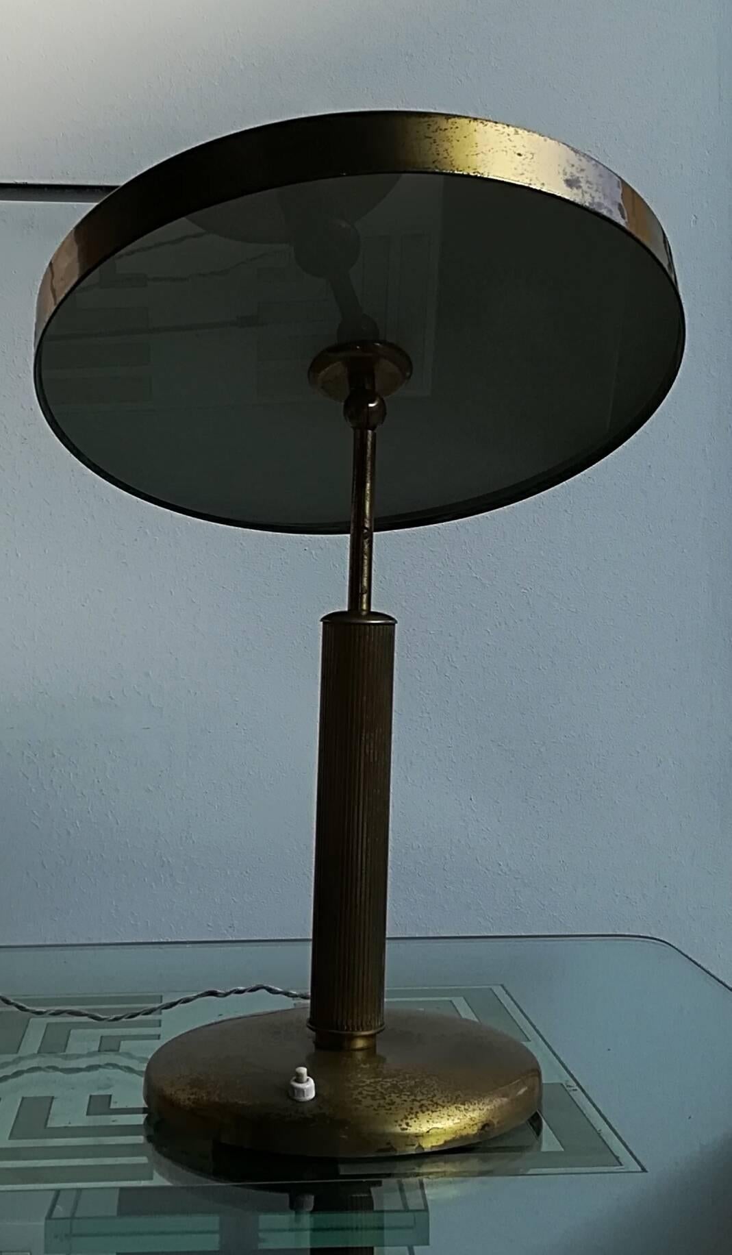 Table lamp Fontana Arte 1940 orientabile, brass and glass.