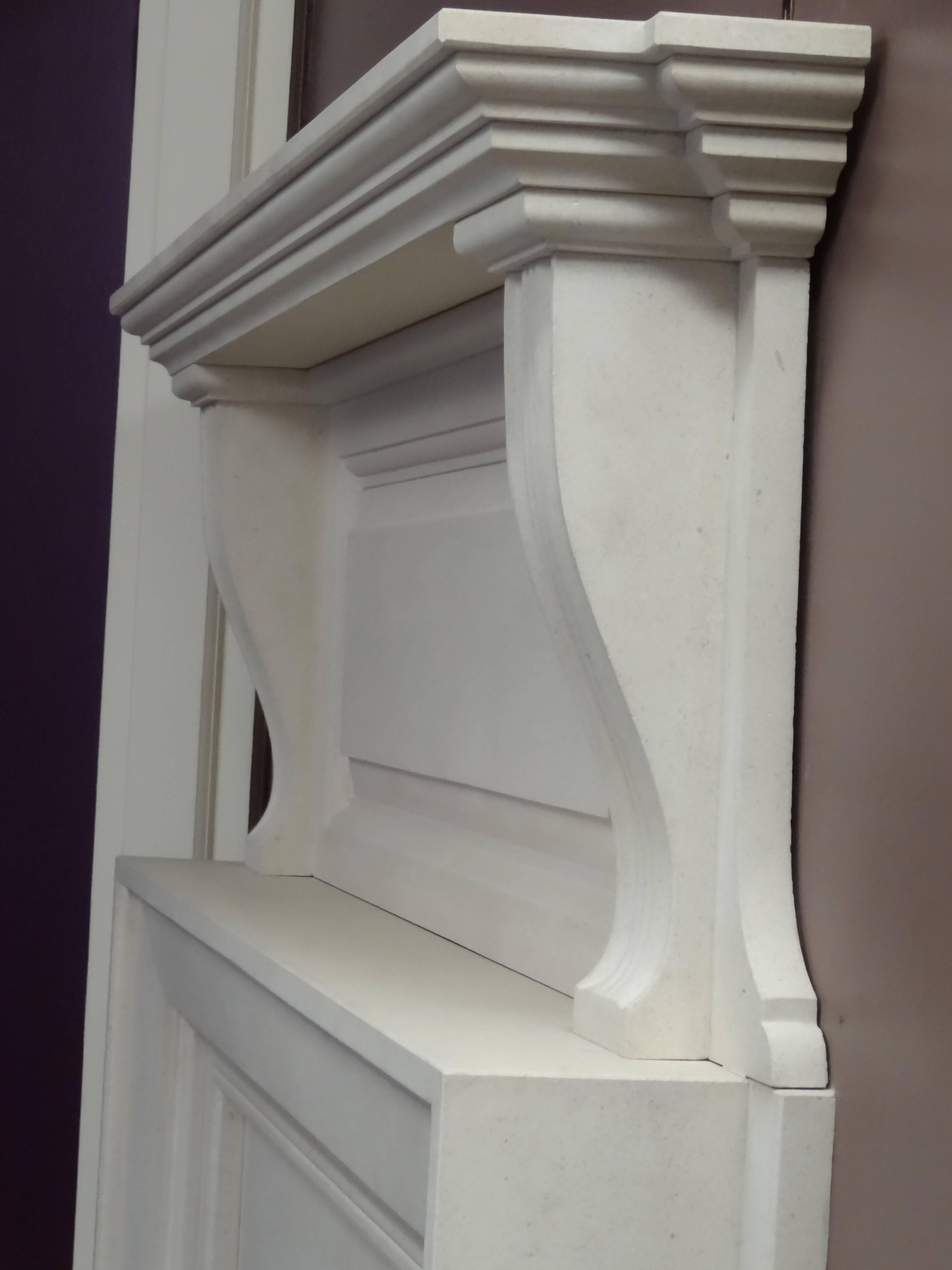 Contemporary Irish Edwardian Style Limestone Fireplace with Black Metal Frame and Fire Basket For Sale