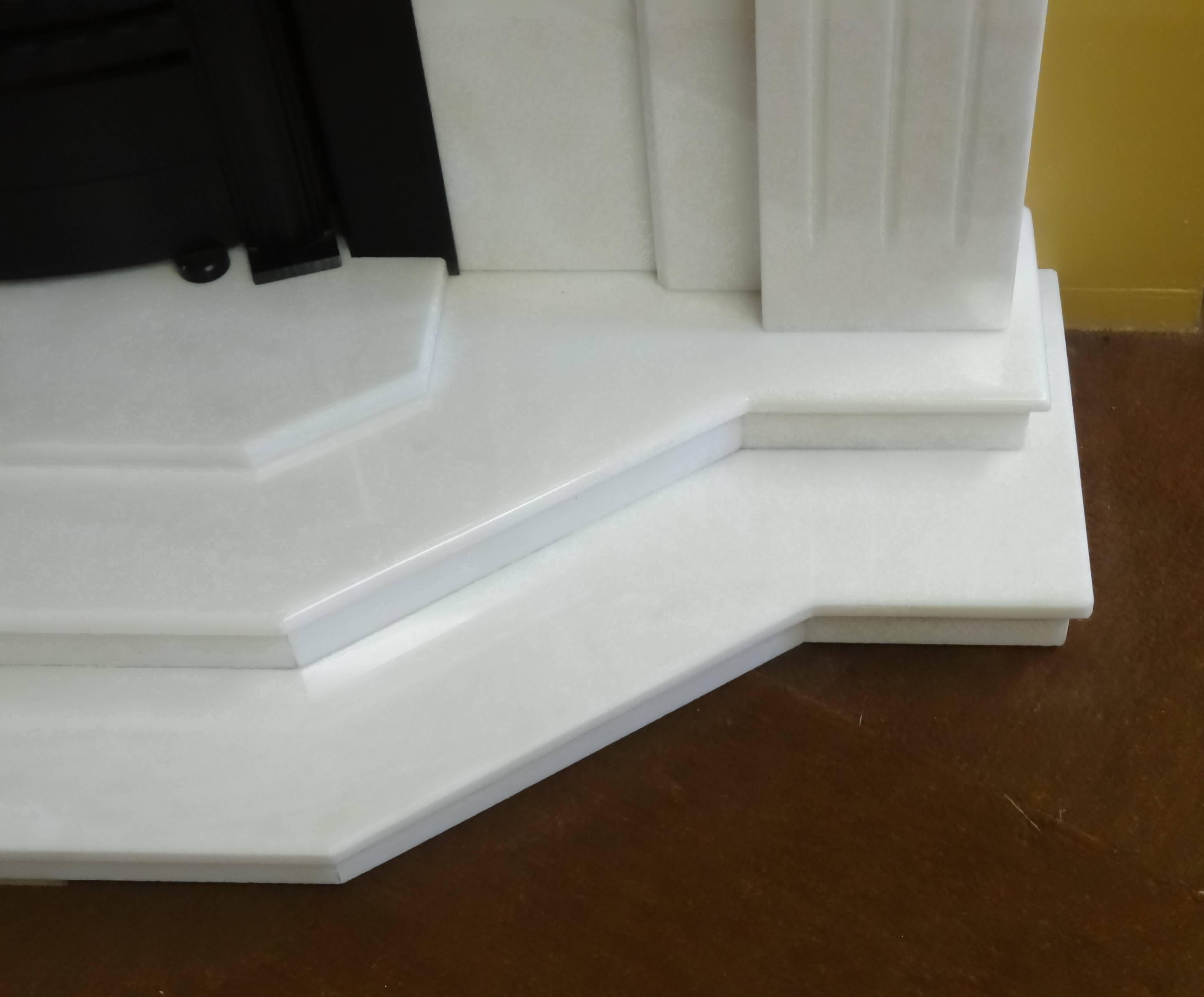 21st Century Contemporary Carved Marble Fireplace with Metal Trim and Fire Grate In Excellent Condition For Sale In Lurgan, Northern Ireland