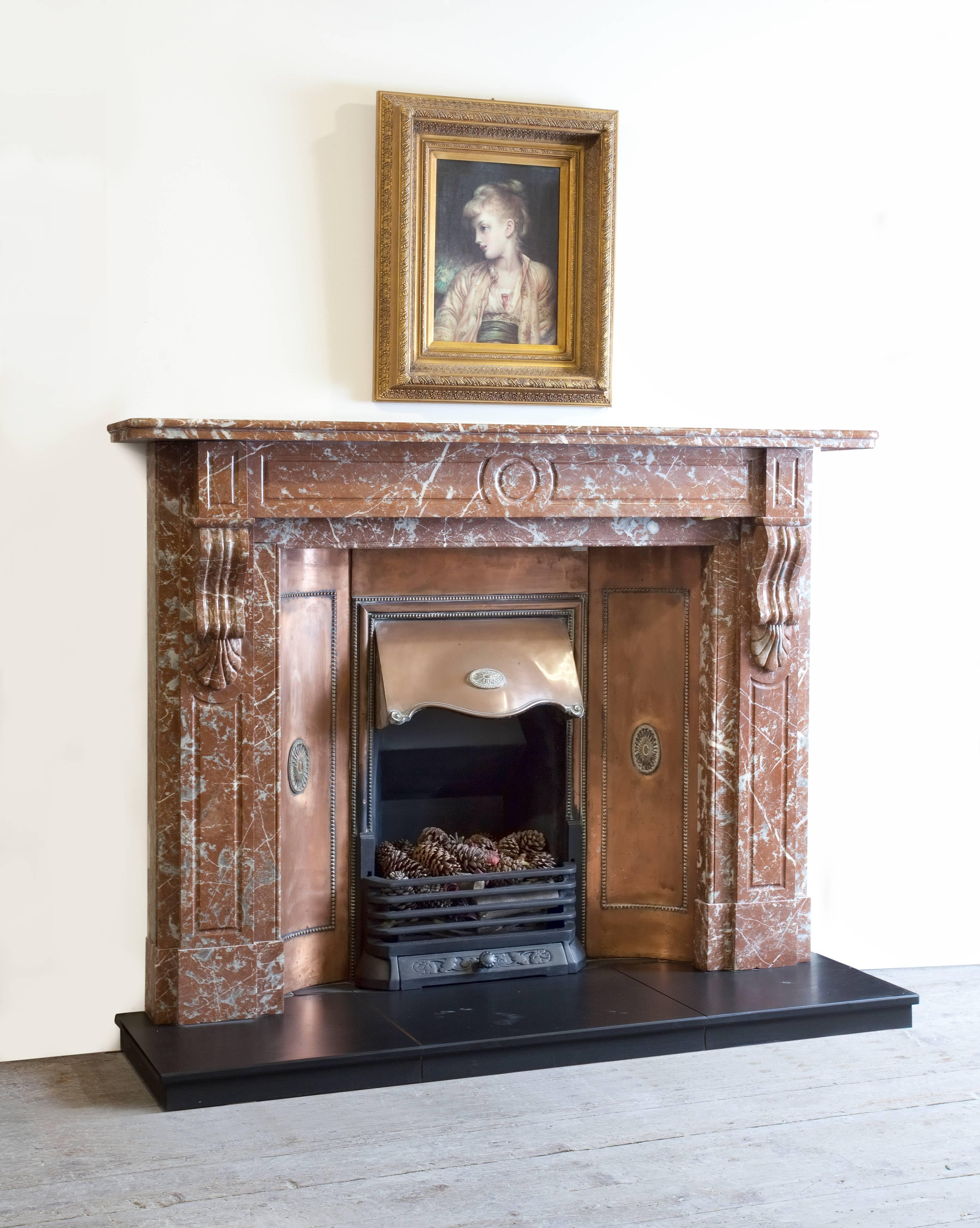 Northern Irish 19th Century, Victorian Carved Breche Marble Fireplace with Curved Copper Insert For Sale