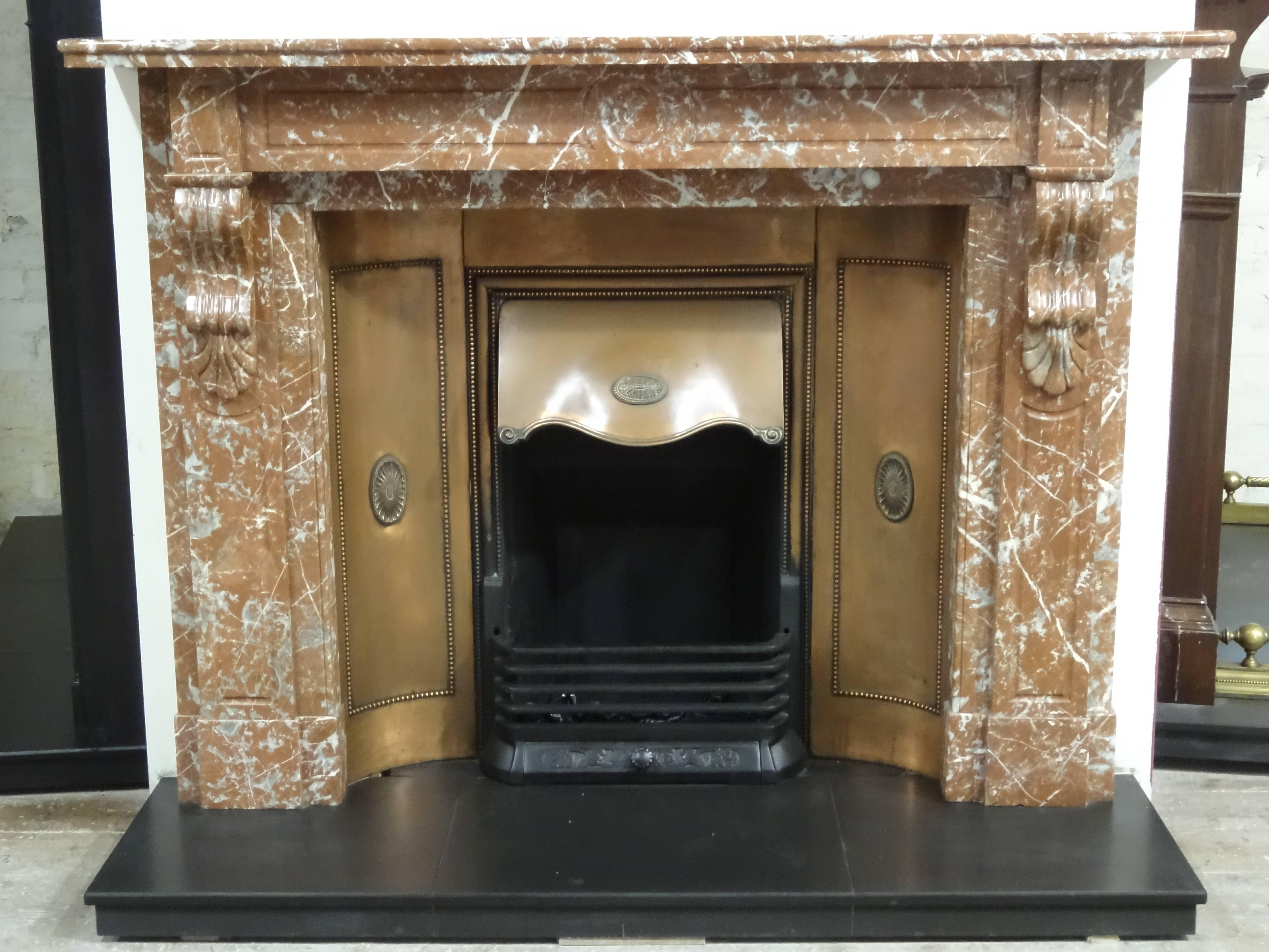 Hand-Carved 19th Century, Victorian Carved Breche Marble Fireplace with Curved Copper Insert For Sale