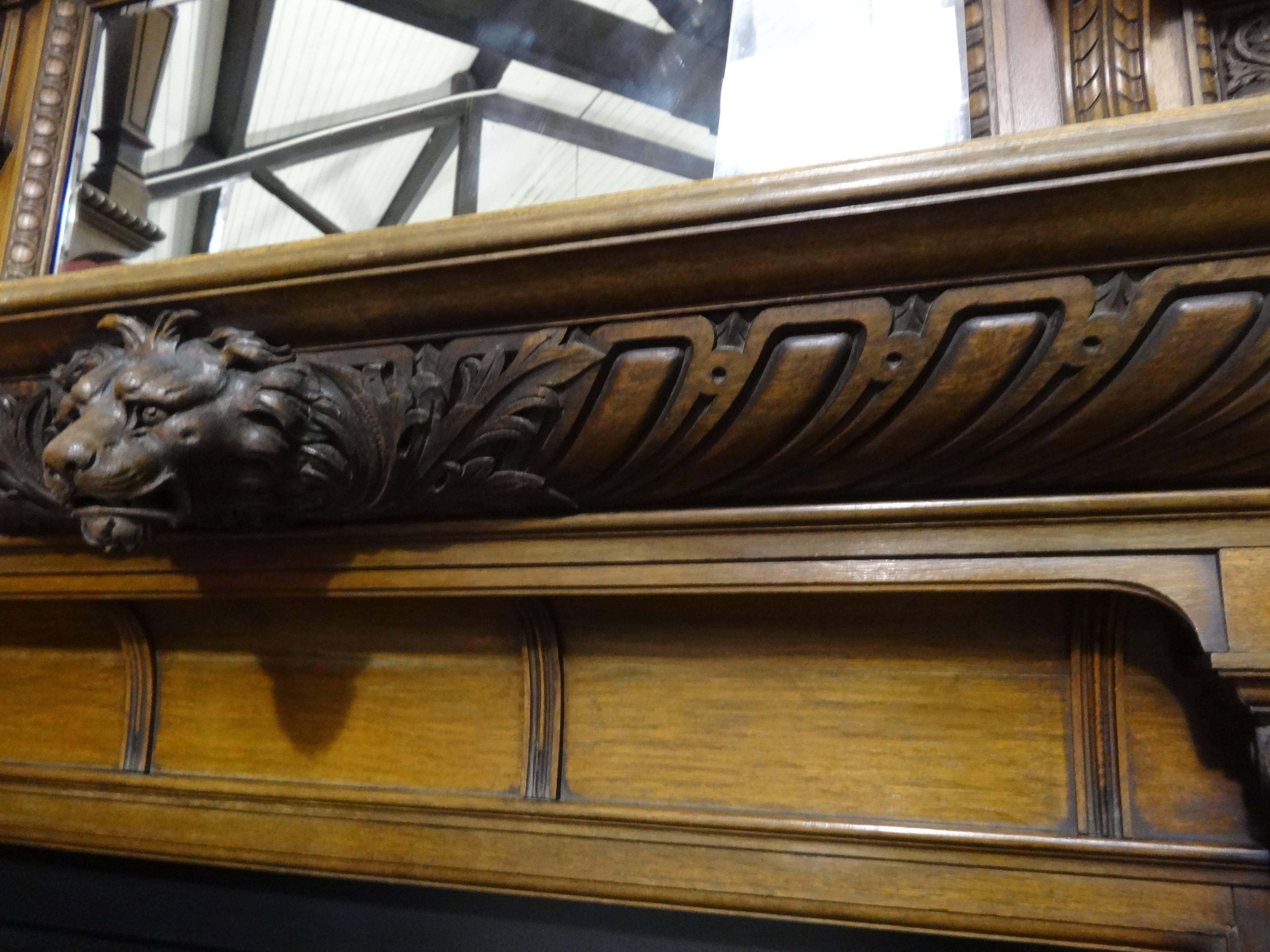 Hand-Carved 19th Century Victorian Carved Oak Fire Surround with Arched Cast Iron Insert For Sale