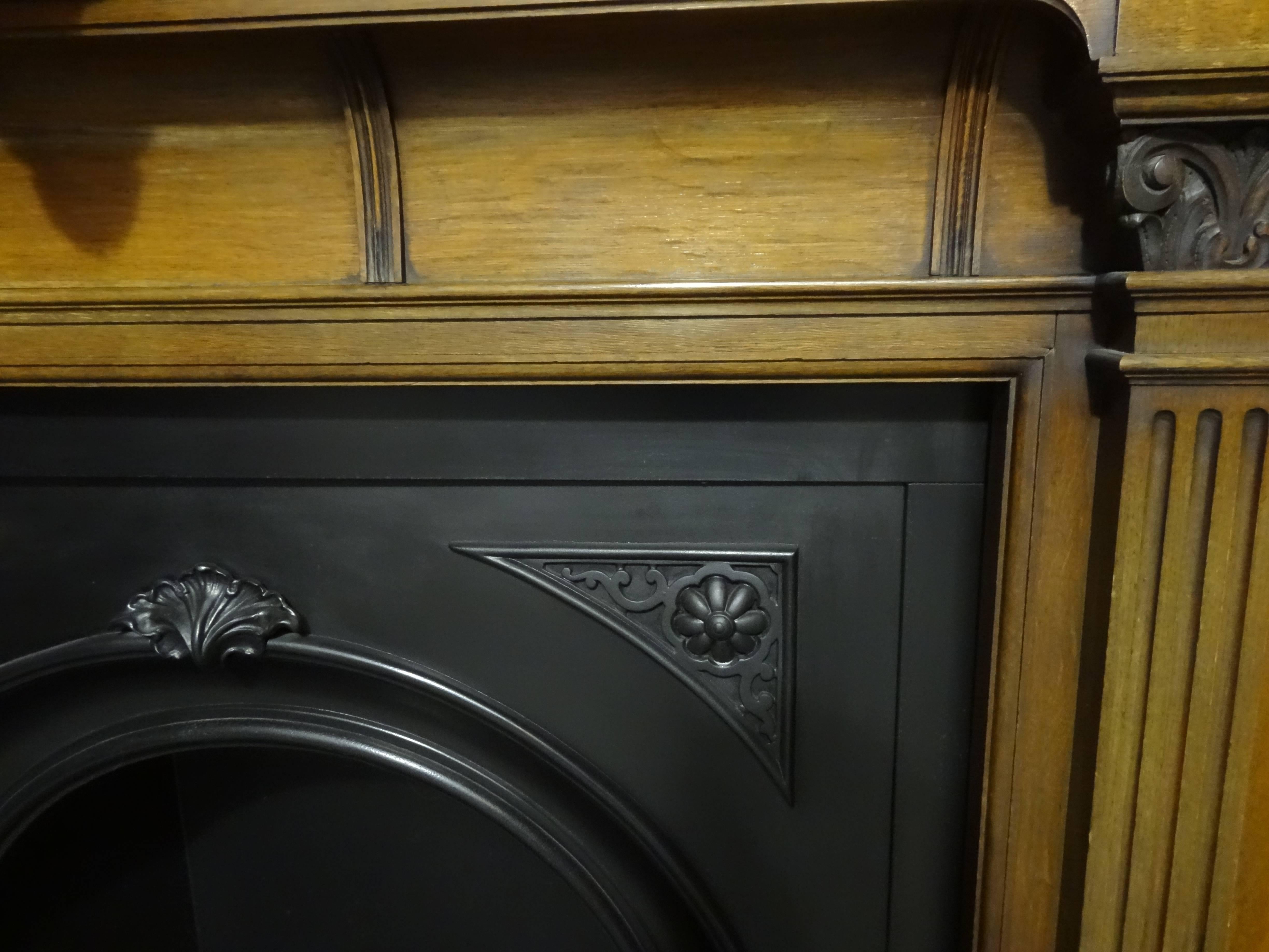 19th Century Victorian Carved Oak Fire Surround with Arched Cast Iron Insert For Sale 3
